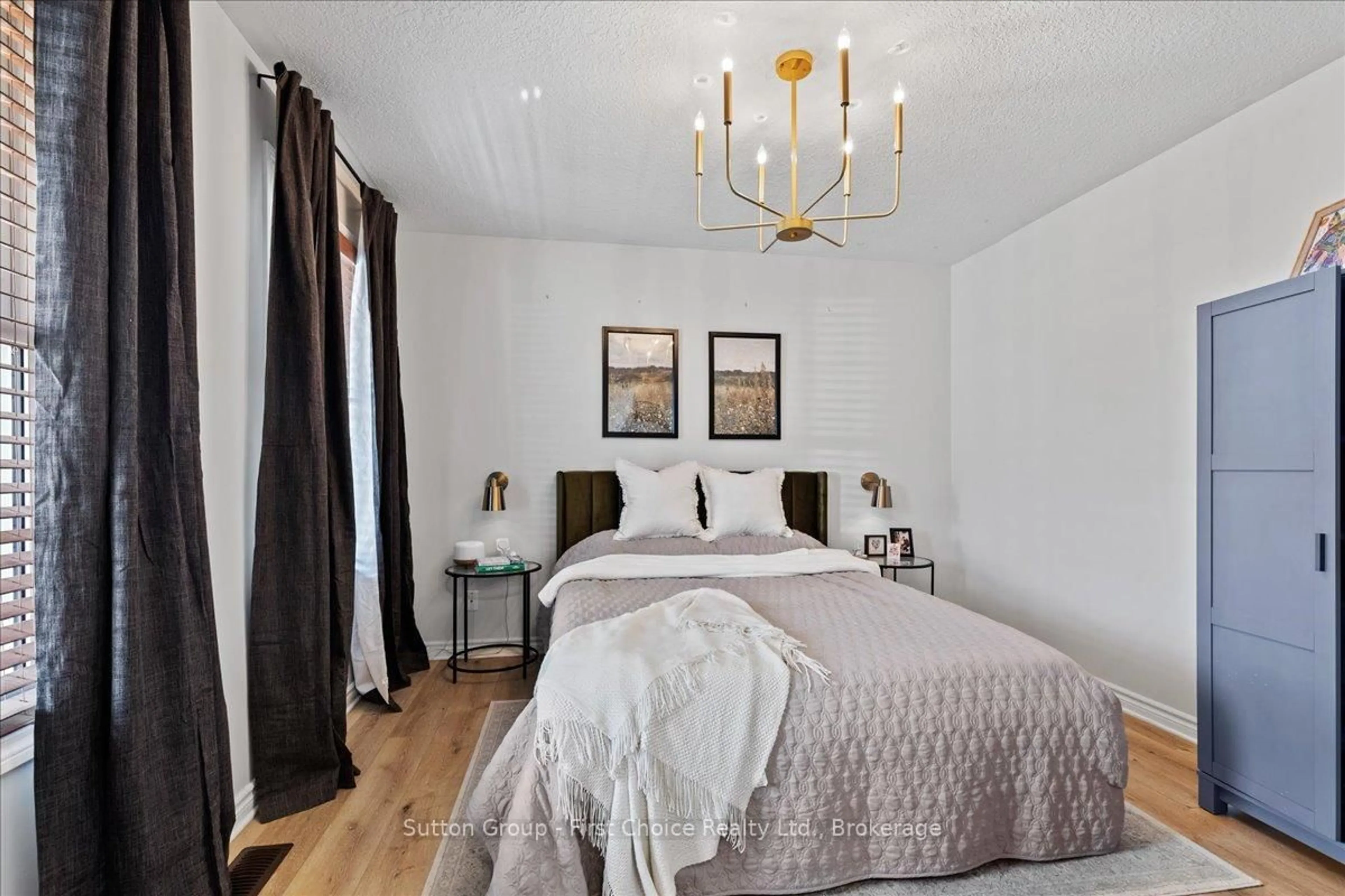 Bedroom with bed, wood/laminate floor for 187 Southvale Rd, St. Marys Ontario N4X 1E9