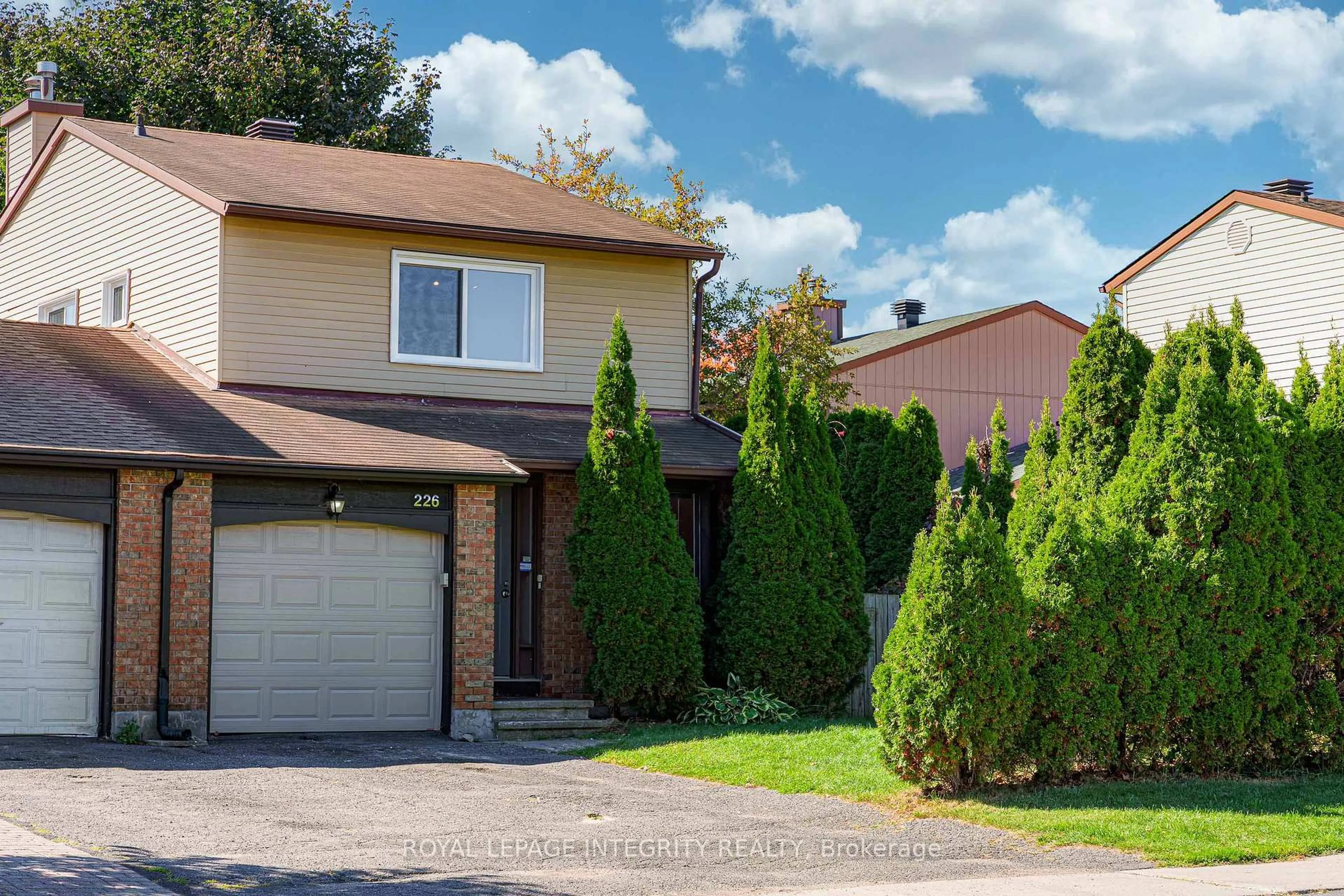 Home with vinyl exterior material, street for 226 Sherway Dr, Barrhaven Ontario K2J 2G3