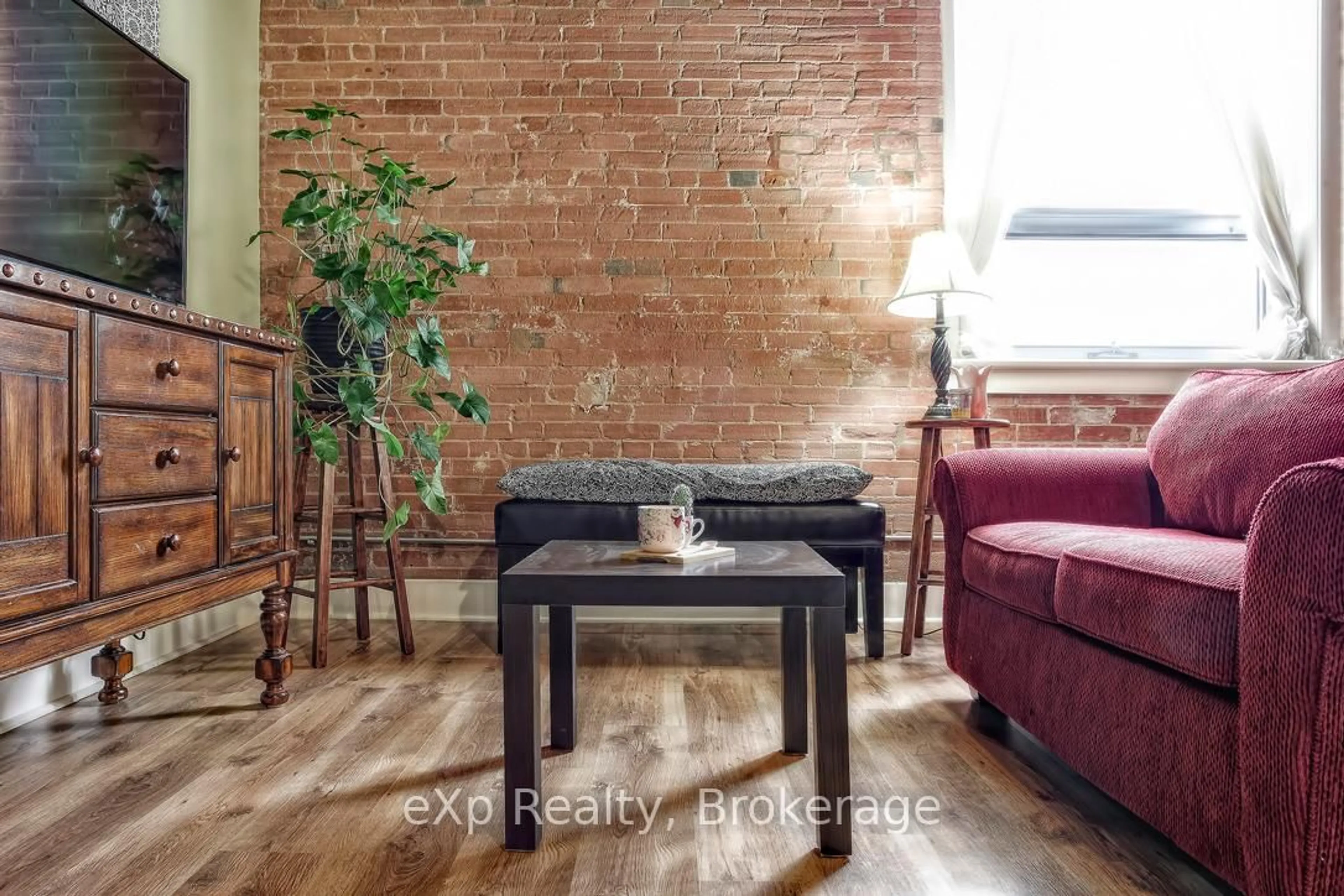 Living room with furniture, unknown for 26 Ontario St #111, Guelph Ontario N1E 7K1