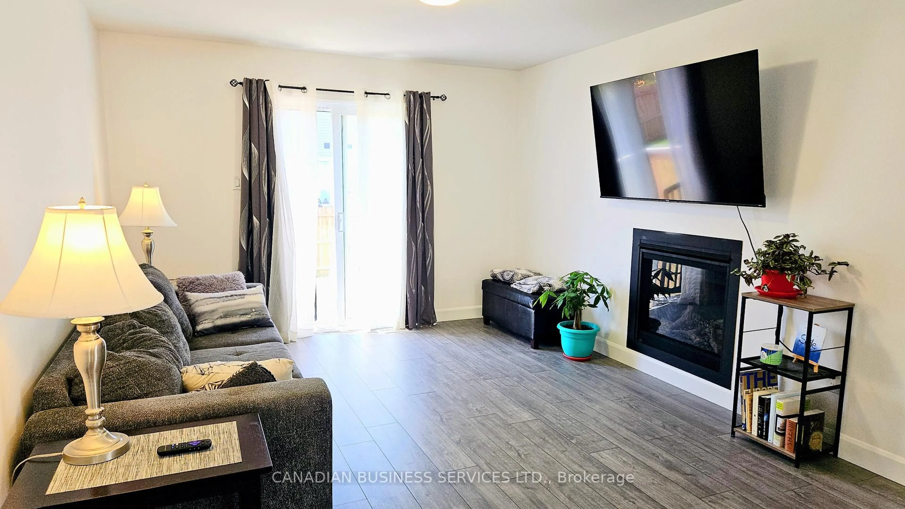 Living room with furniture, wood/laminate floor for 134 Giroux St, The Nation Ontario K0A 2M0