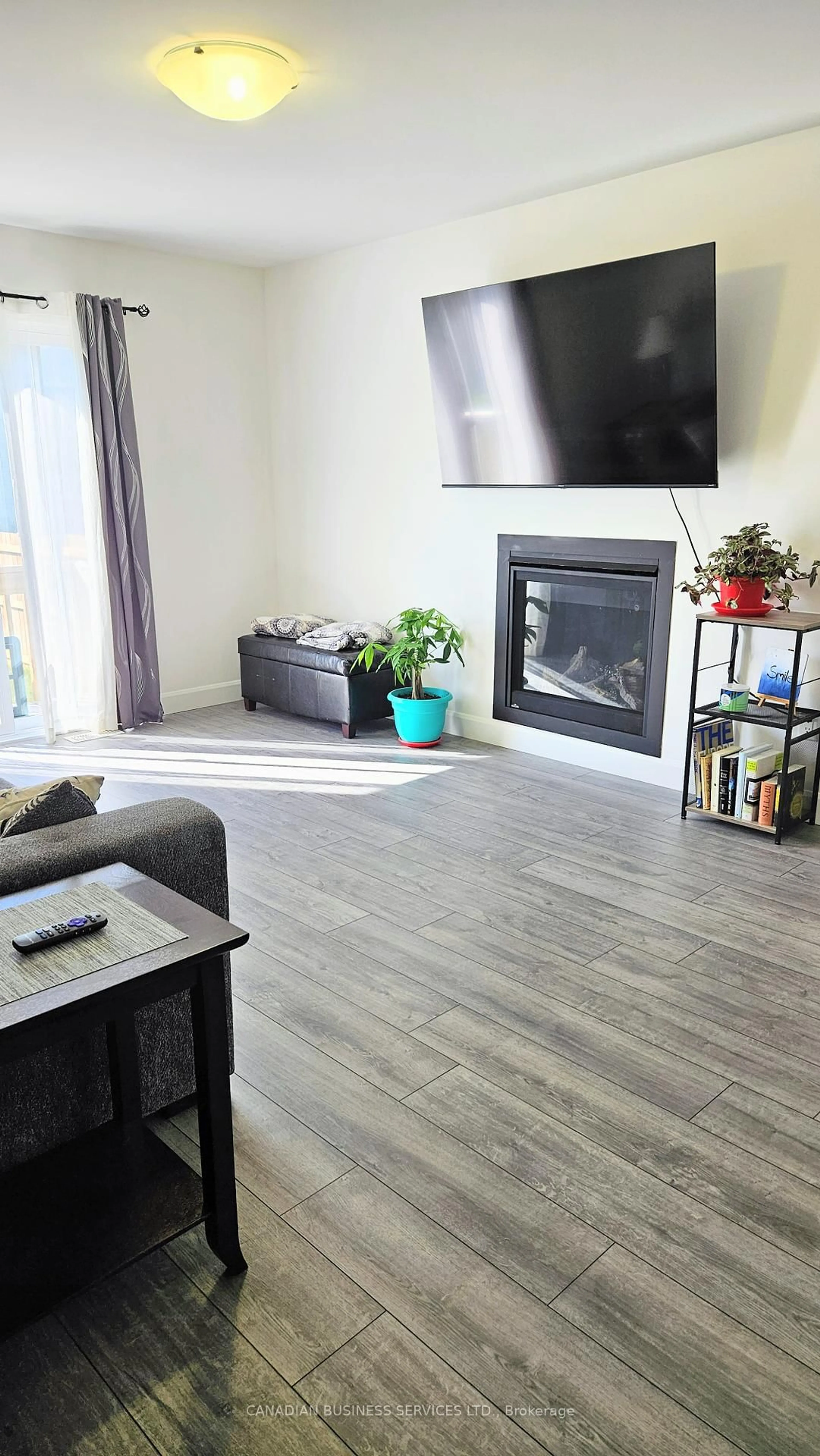 Living room with furniture, wood/laminate floor for 134 Giroux St, The Nation Ontario K0A 2M0