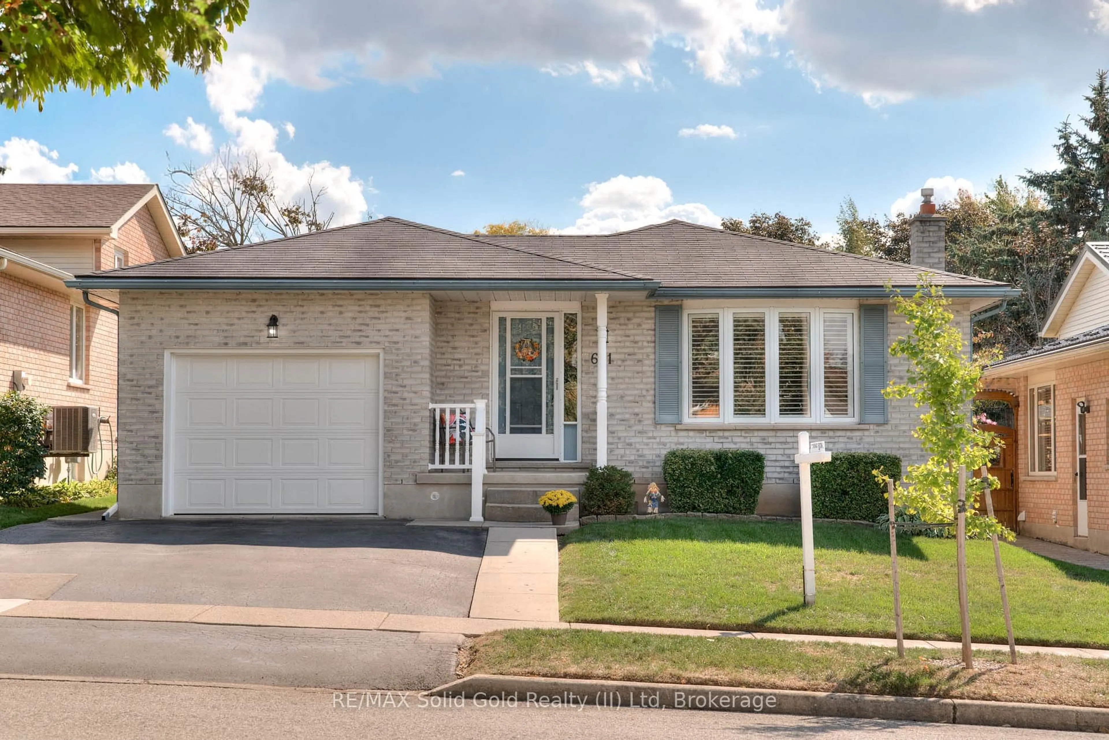 Home with brick exterior material, street for 621 Sprucehurst Cres, Waterloo Ontario N2V 2E3