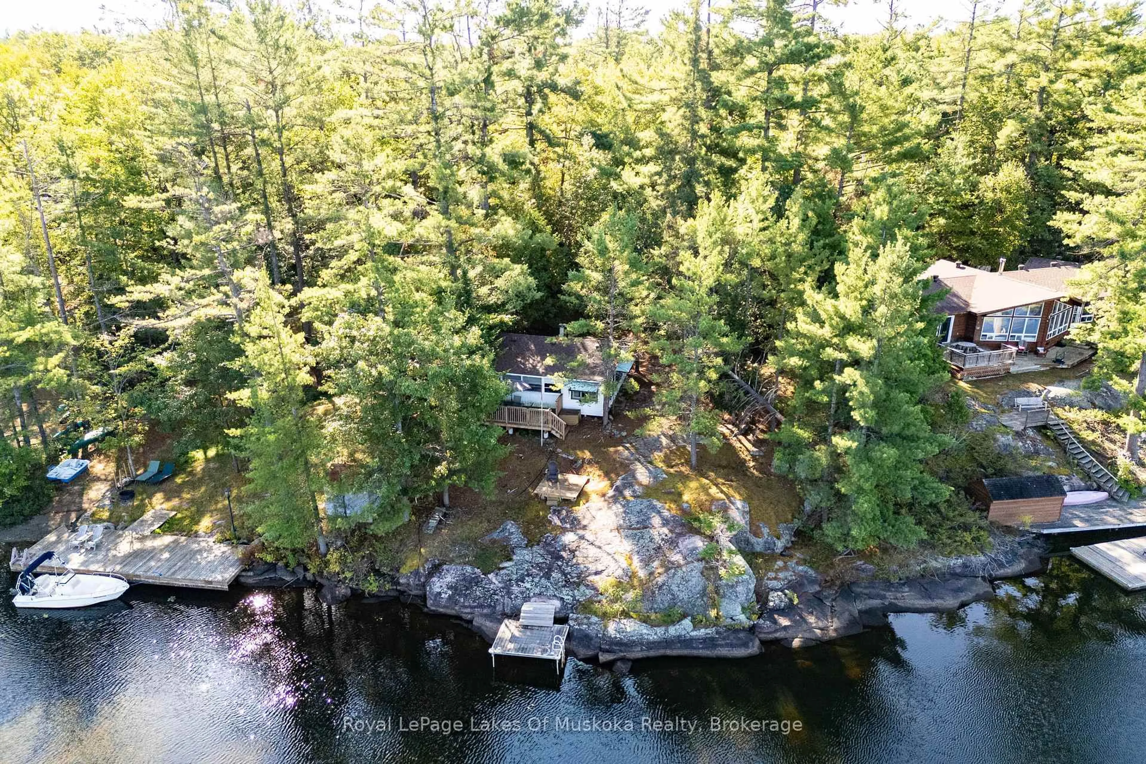 A pic from outside/outdoor area/front of a property/back of a property/a pic from drone, water/lake/river/ocean view for 1010 Tara Lane, Gravenhurst Ontario P0E 1N0