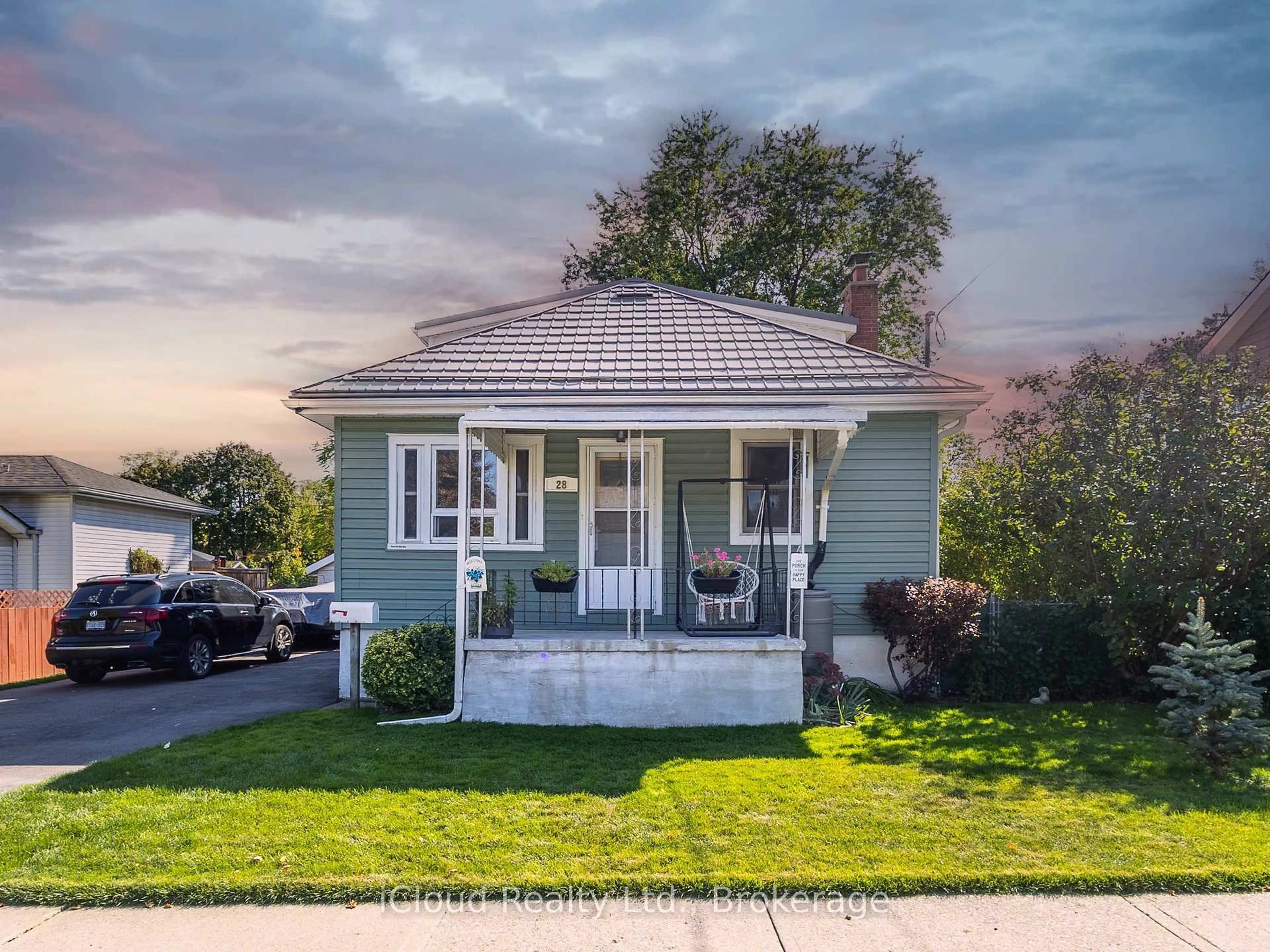 Home with vinyl exterior material, street for 28 Barton St, Guelph Ontario N1H 1M3