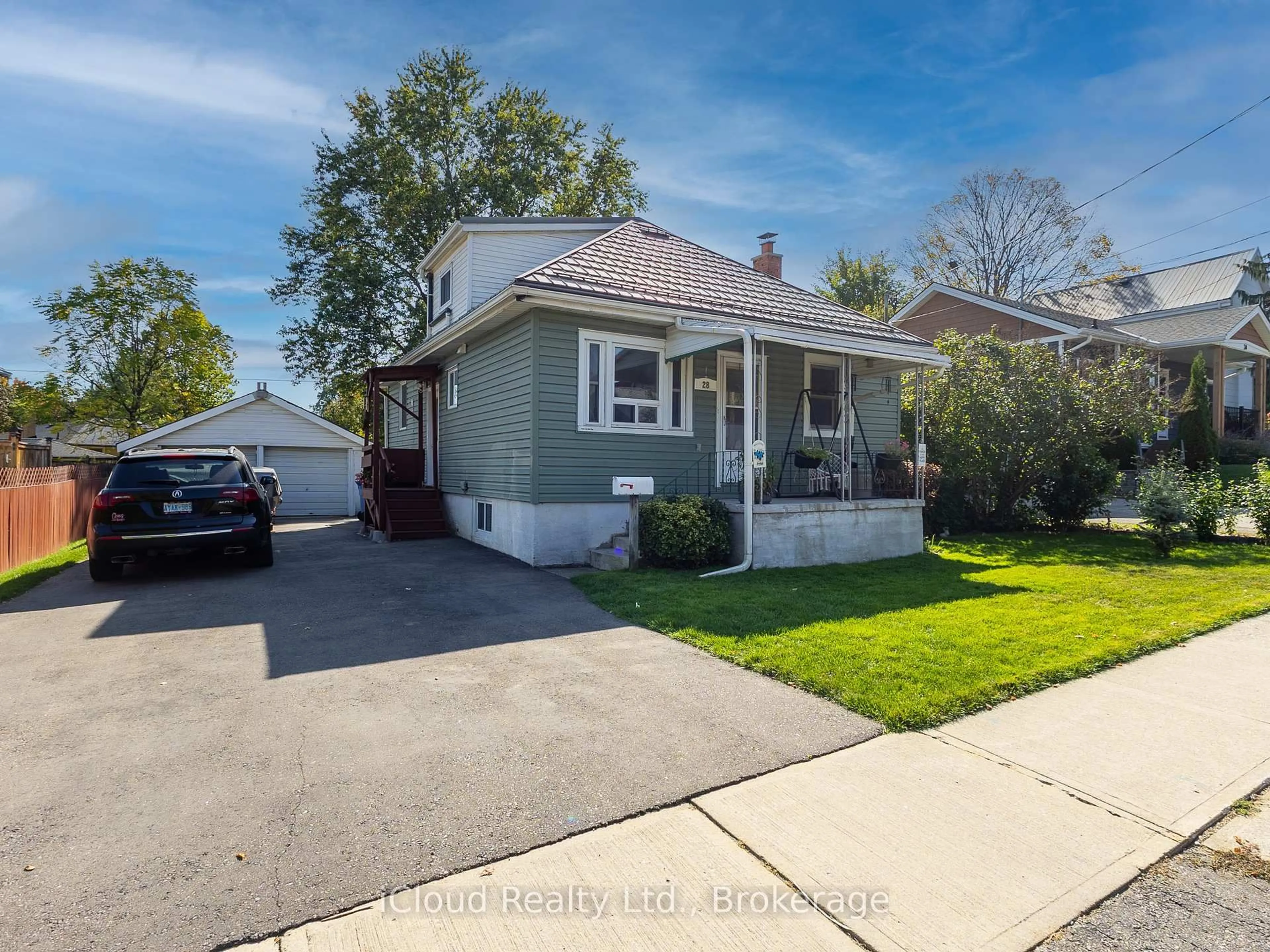 Home with vinyl exterior material, street for 28 Barton St, Guelph Ontario N1H 1M3