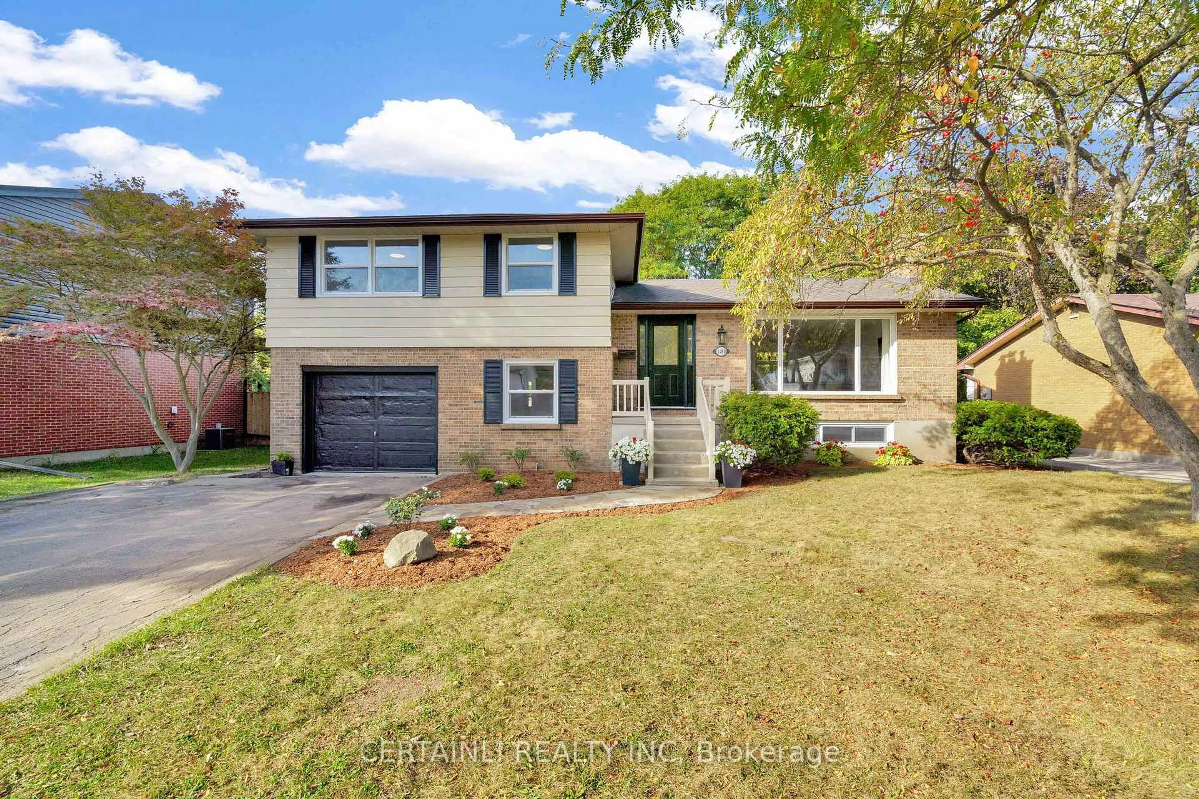 Home with brick exterior material, street for 1180 Guildwood Blvd, London North Ontario N6H 4G9