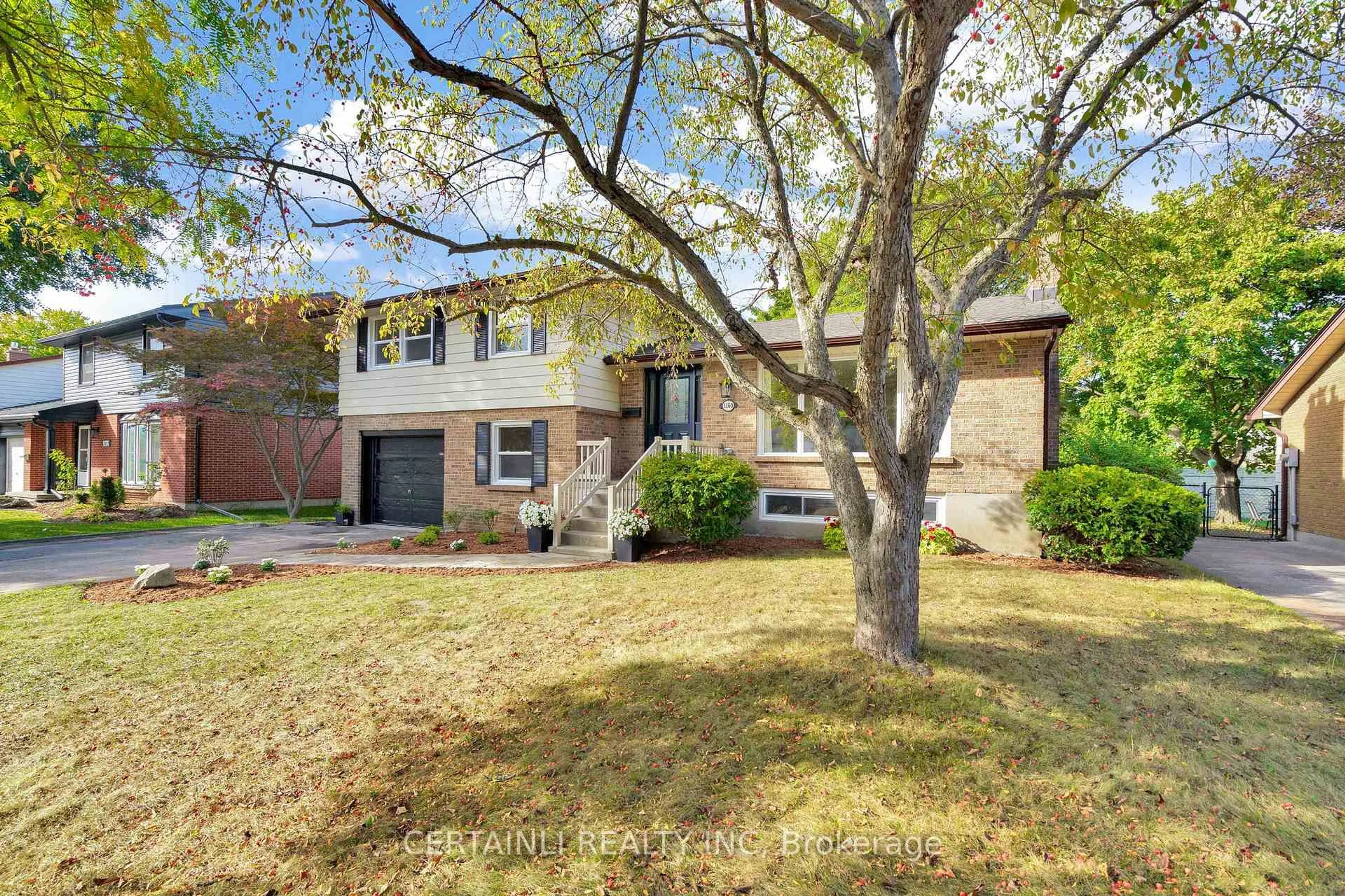 Home with brick exterior material, street for 1180 Guildwood Blvd, London North Ontario N6H 4G9