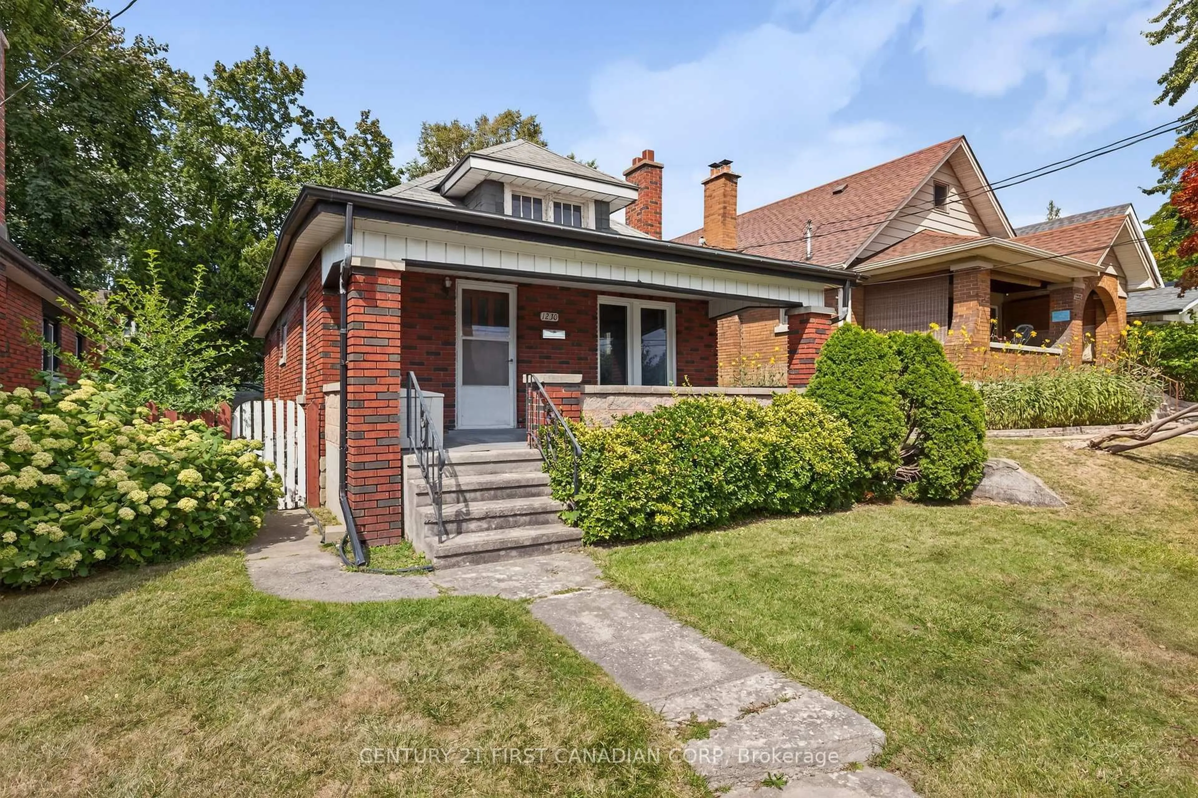 Home with brick exterior material, street for 1230 Dundas St, London East Ontario N5W 3B2