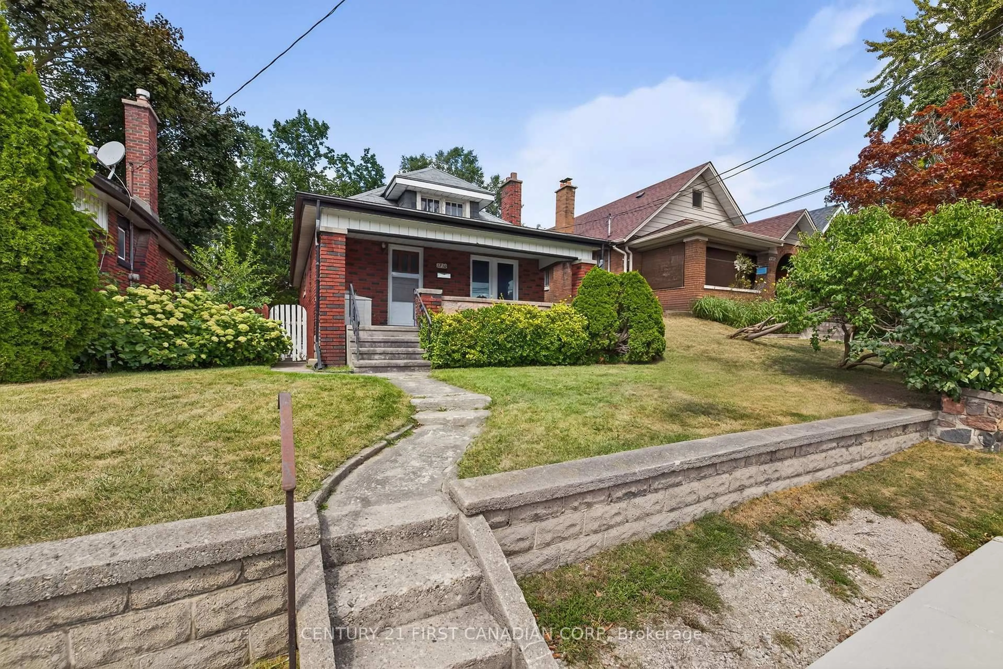Home with brick exterior material, street for 1230 Dundas St, London East Ontario N5W 3B2