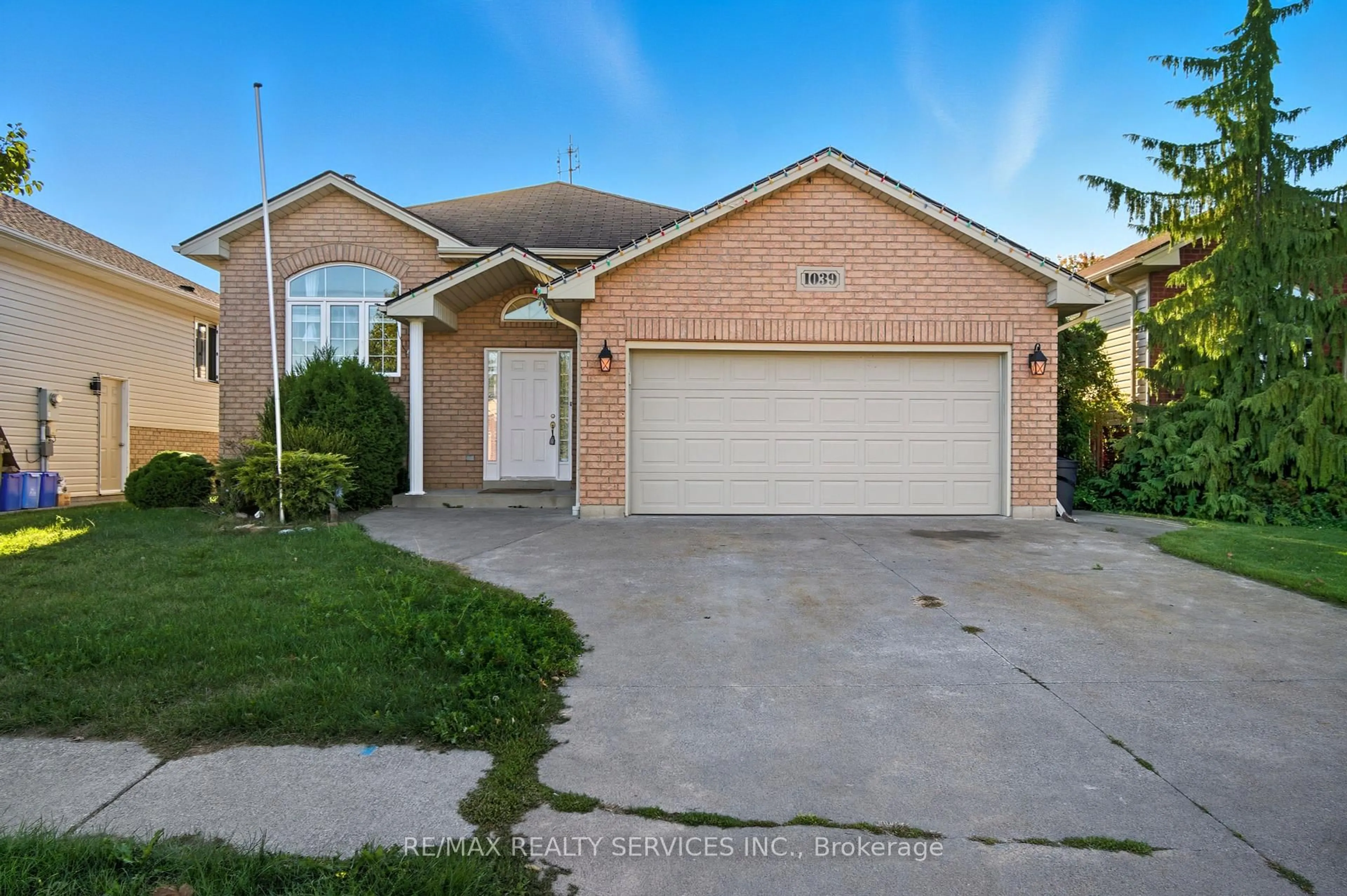 Home with brick exterior material, street for 1039 Clover Ave, Windsor Ontario N8P 1V8