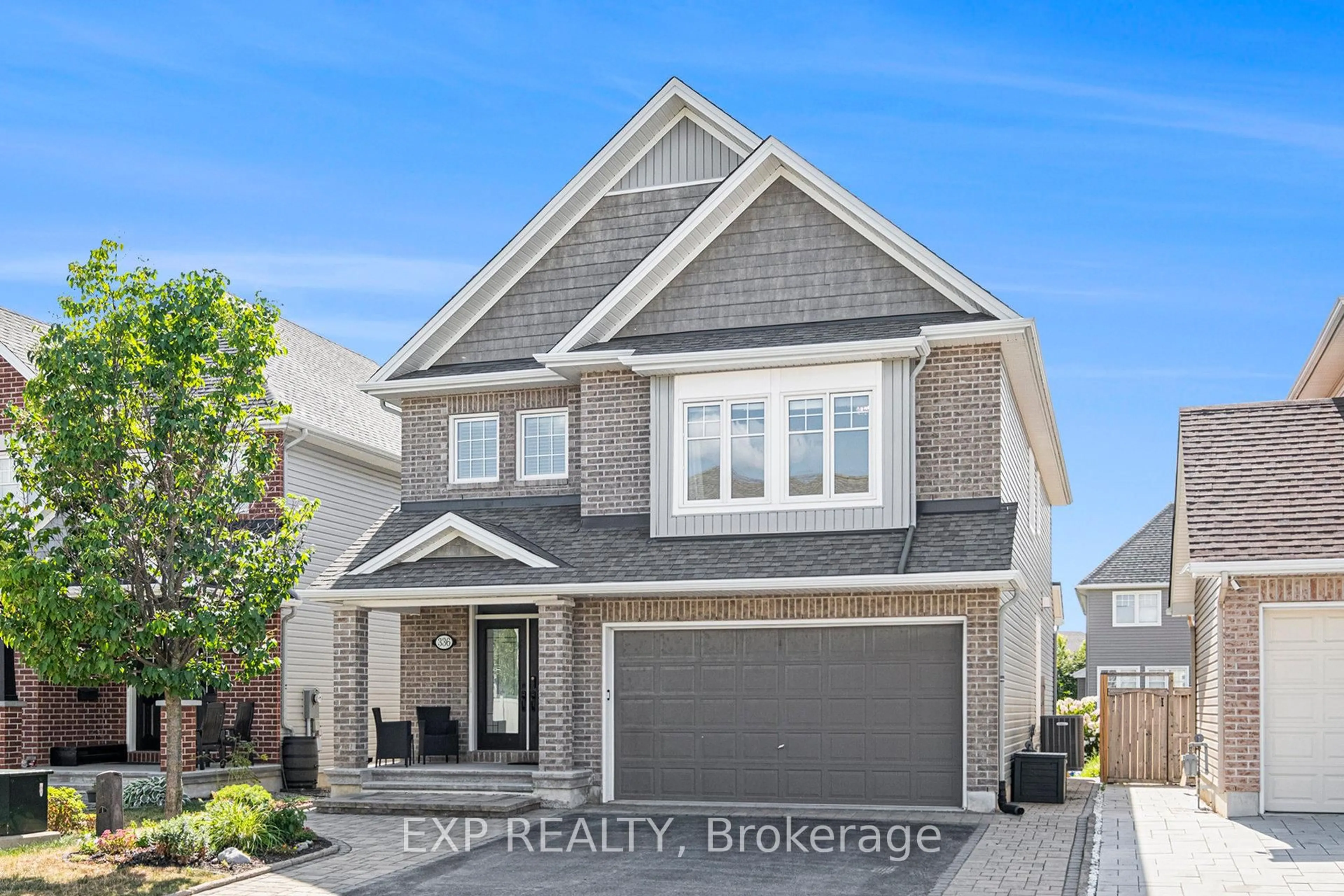 Home with brick exterior material, street for 336 Towhee Pl, Ottawa Ontario K2J 5V3