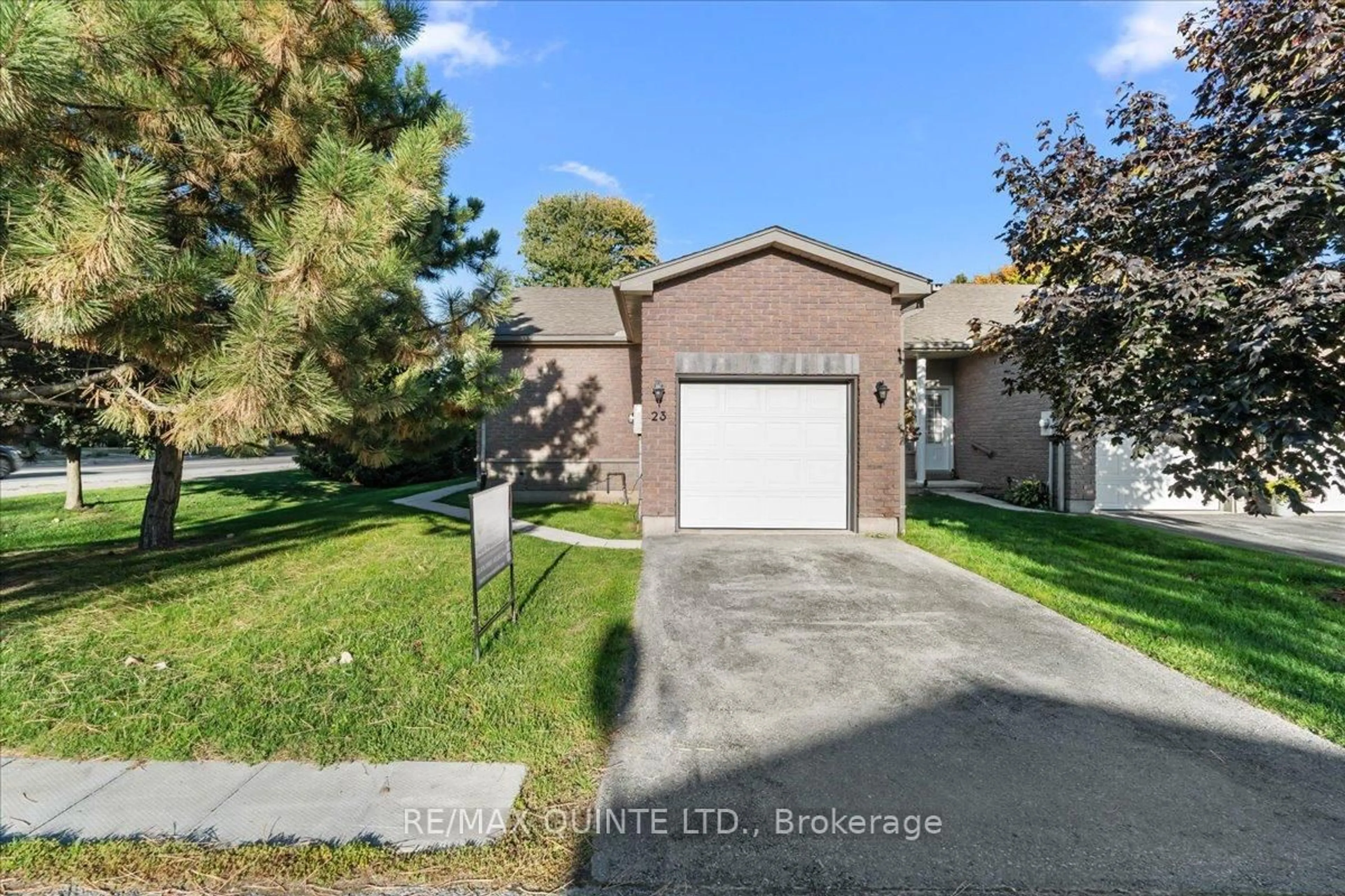 A pic from outside/outdoor area/front of a property/back of a property/a pic from drone, unknown for 1 Rosemary Crt #23, Prince Edward County Ontario K0K 2T0