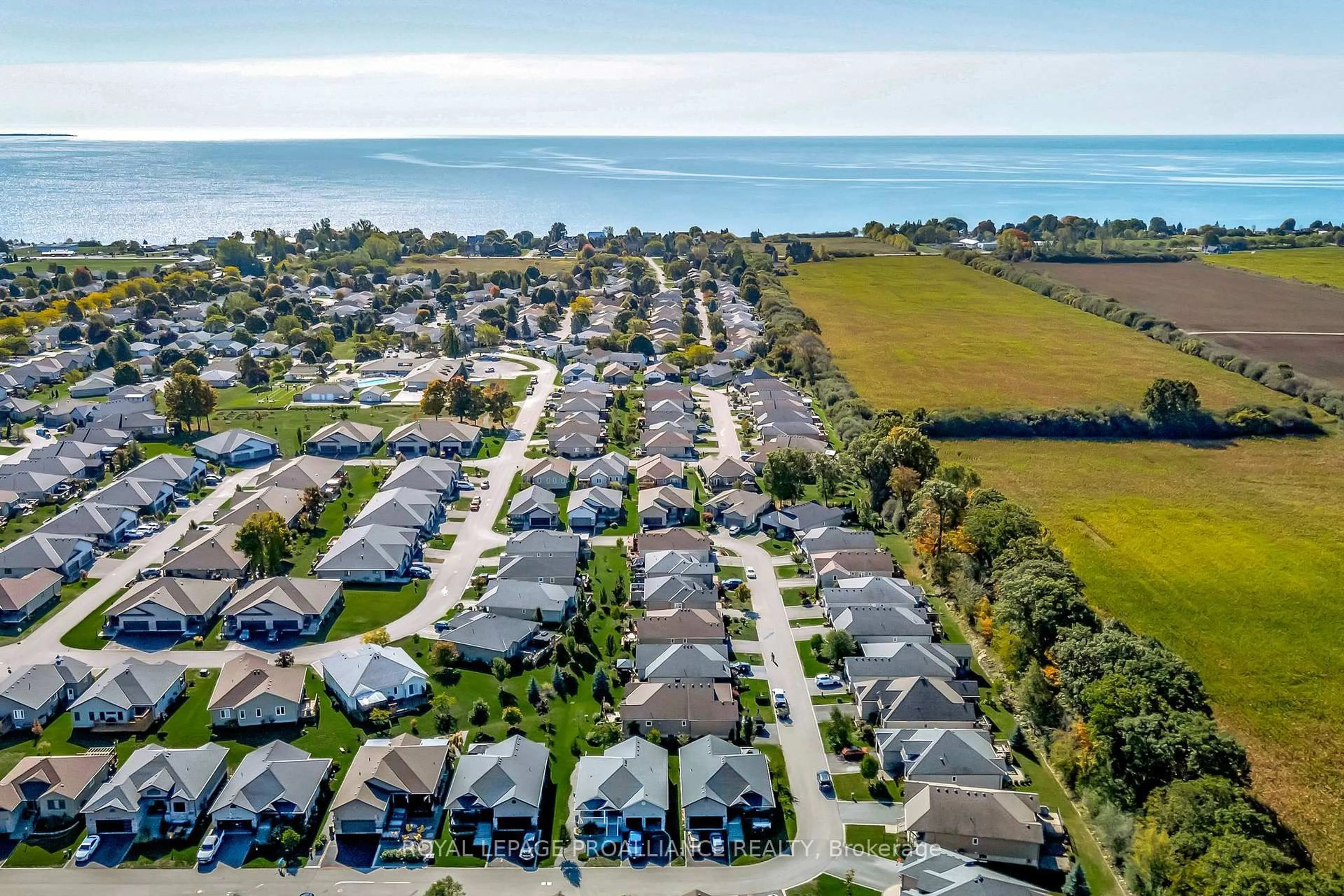 A pic from outside/outdoor area/front of a property/back of a property/a pic from drone, water/lake/river/ocean view for 10 Conger Dr, Prince Edward County Ontario K0K 3L0