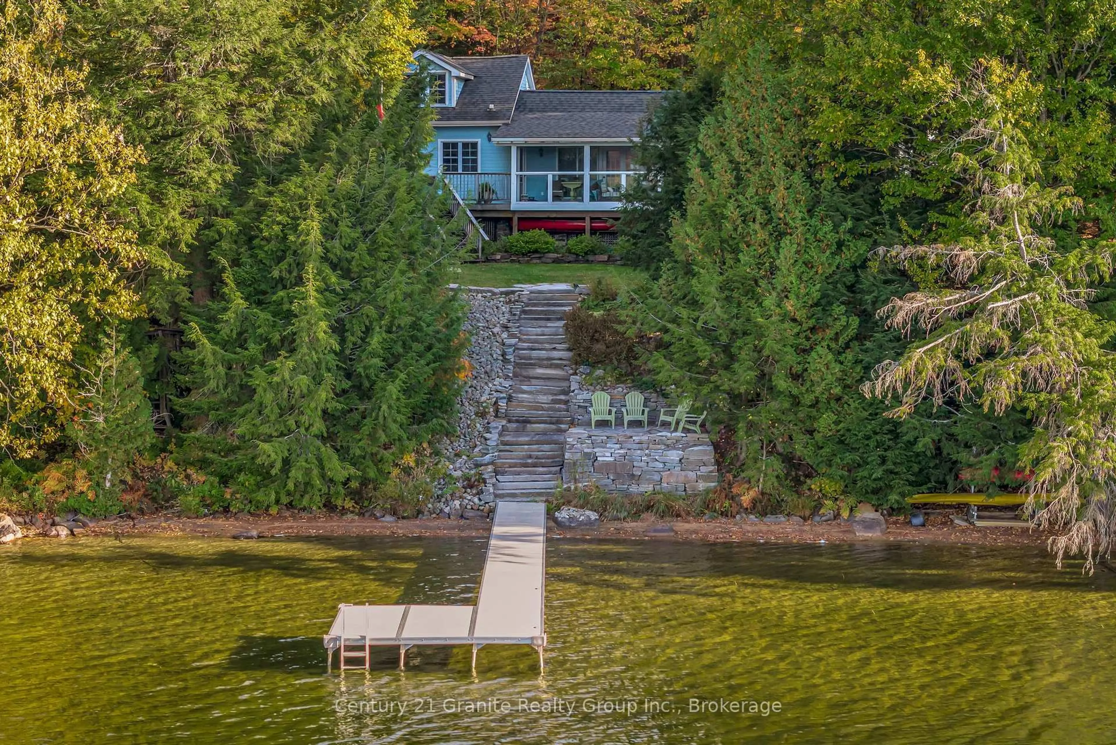 A pic from outside/outdoor area/front of a property/back of a property/a pic from drone, water/lake/river/ocean view for 1050 Whiskey Jack Lane, Algonquin Highlands Ontario K0M 1S0