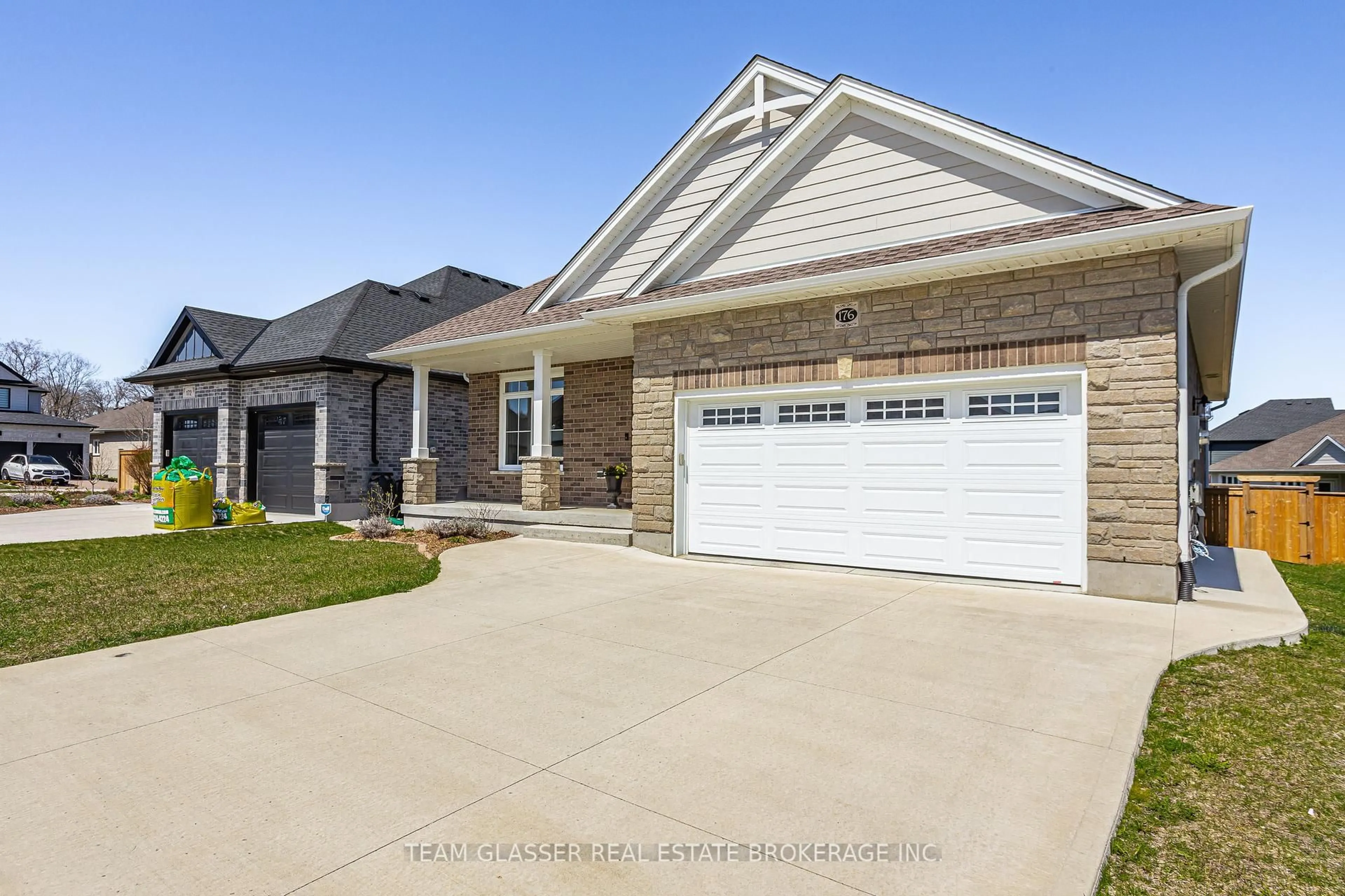 Home with brick exterior material, street for 176 BOARDWALK Way, Thames Centre Ontario N0L 1G2