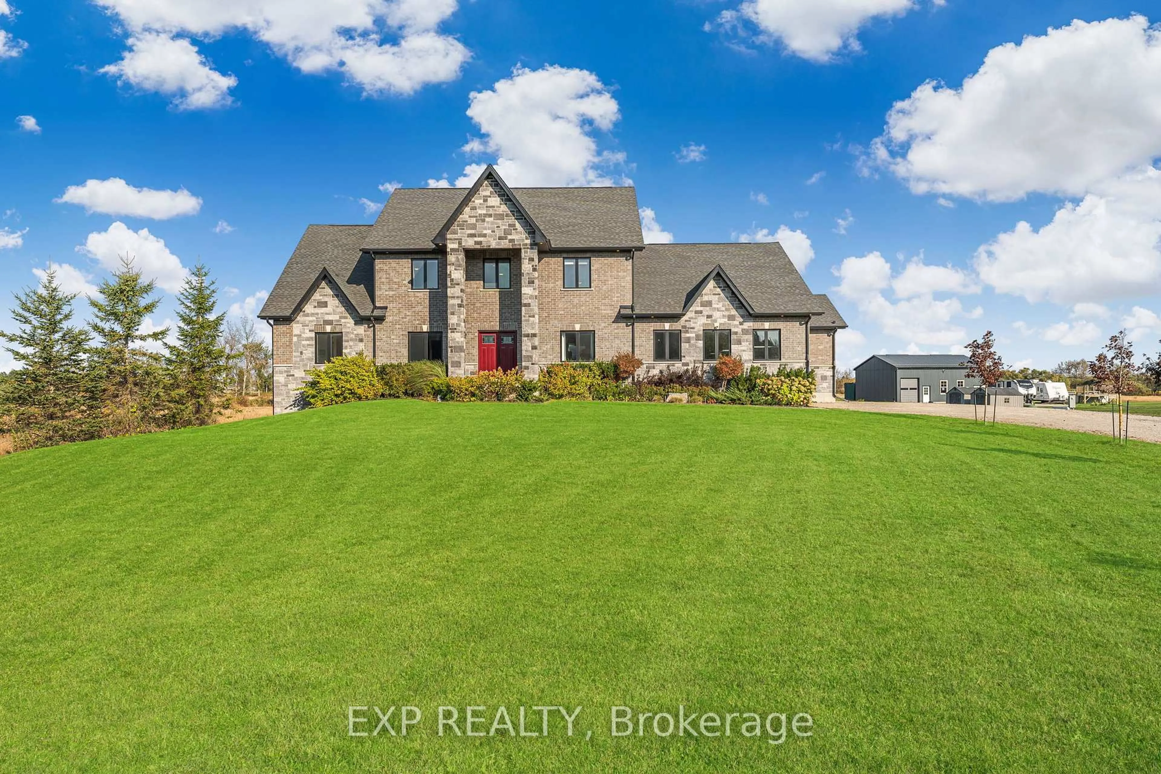 A pic from outside/outdoor area/front of a property/back of a property/a pic from drone, unknown for 373373 6th Line, Amaranth Ontario L9W 0M4