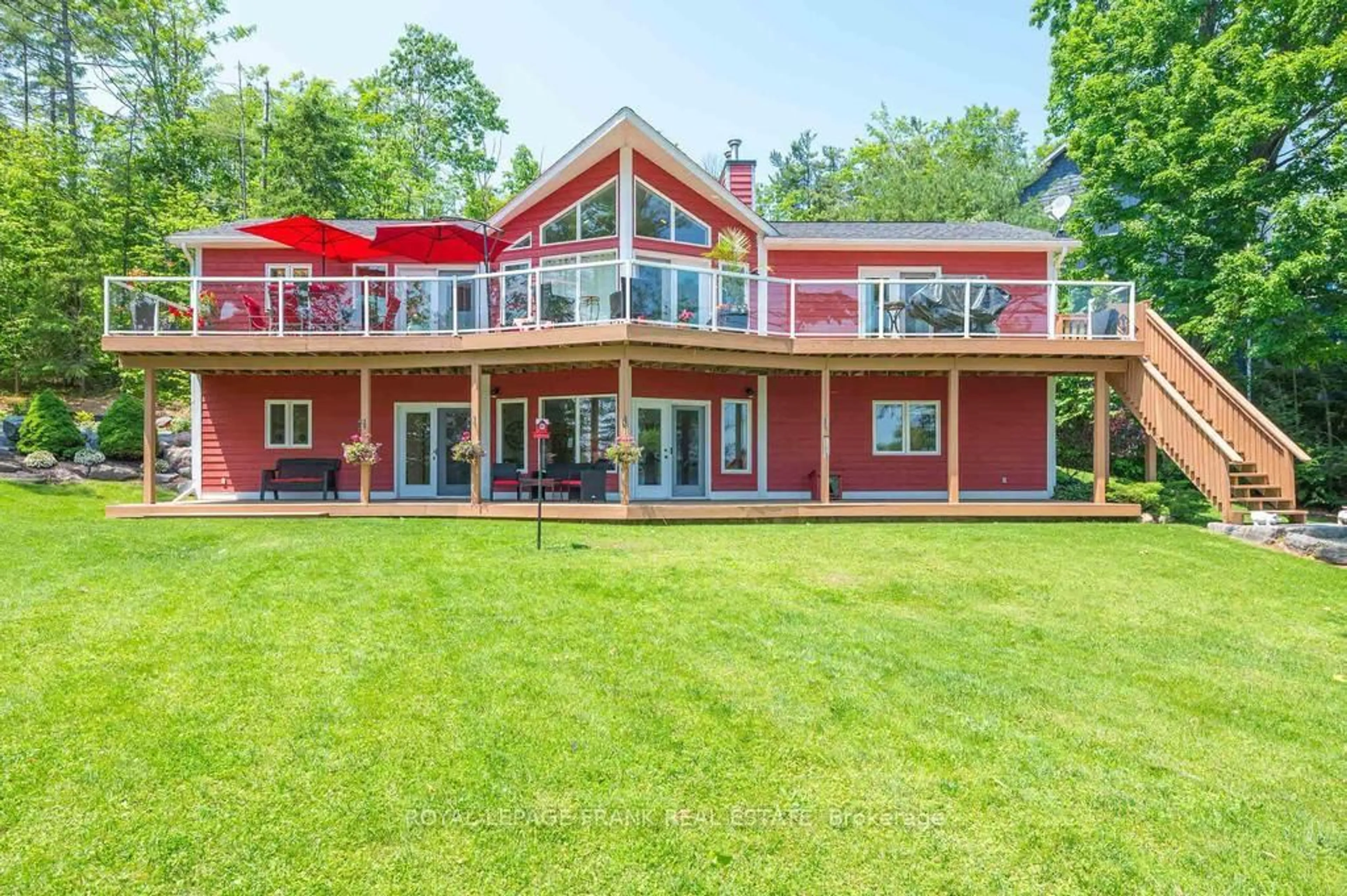 A pic from outside/outdoor area/front of a property/back of a property/a pic from drone, water/lake/river/ocean view for 113 Fire Route 37, Trent Lakes Ontario K0L 1J0