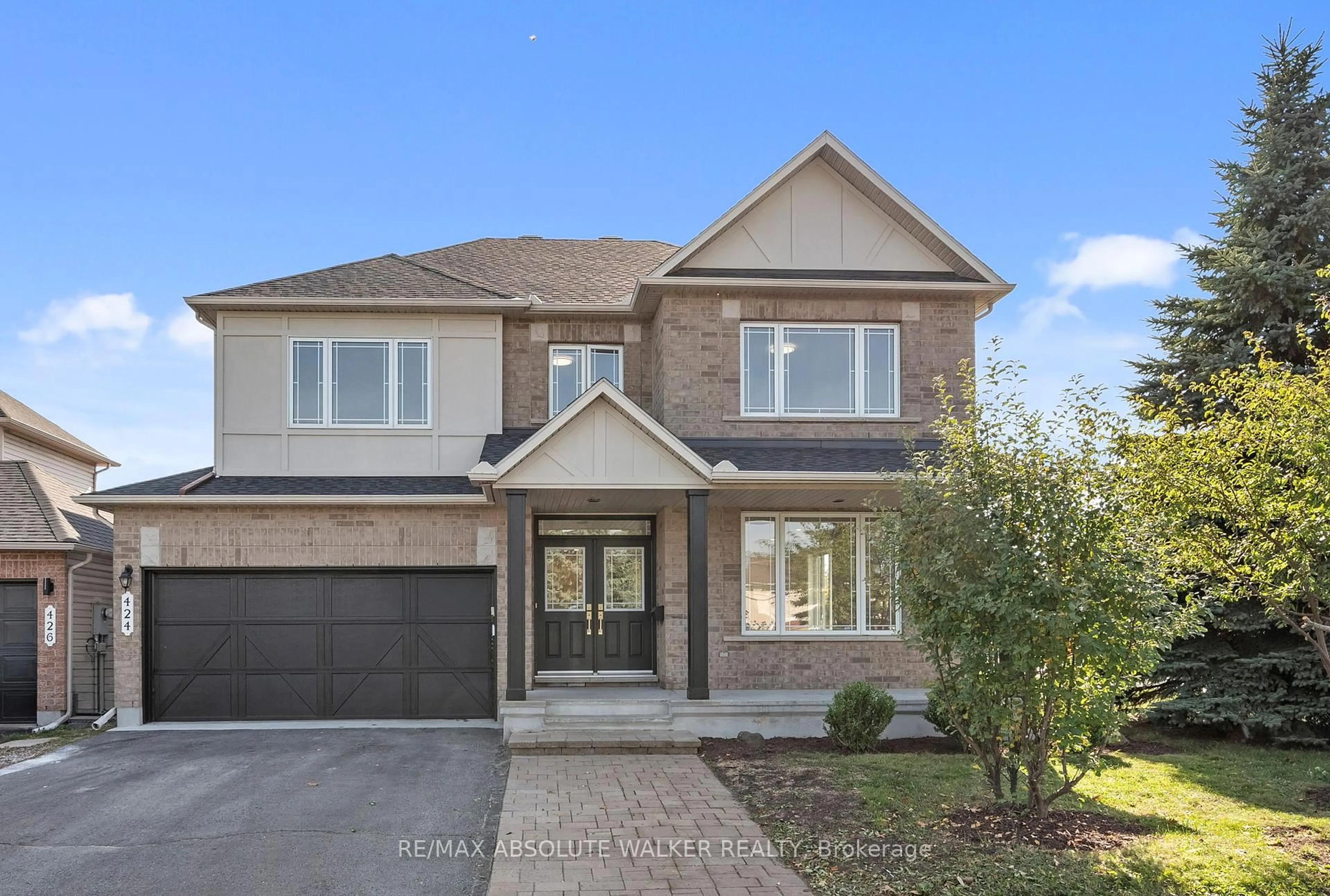 Home with brick exterior material, street for 424 Nittany Cres, Ottawa Ontario K2J 5P1