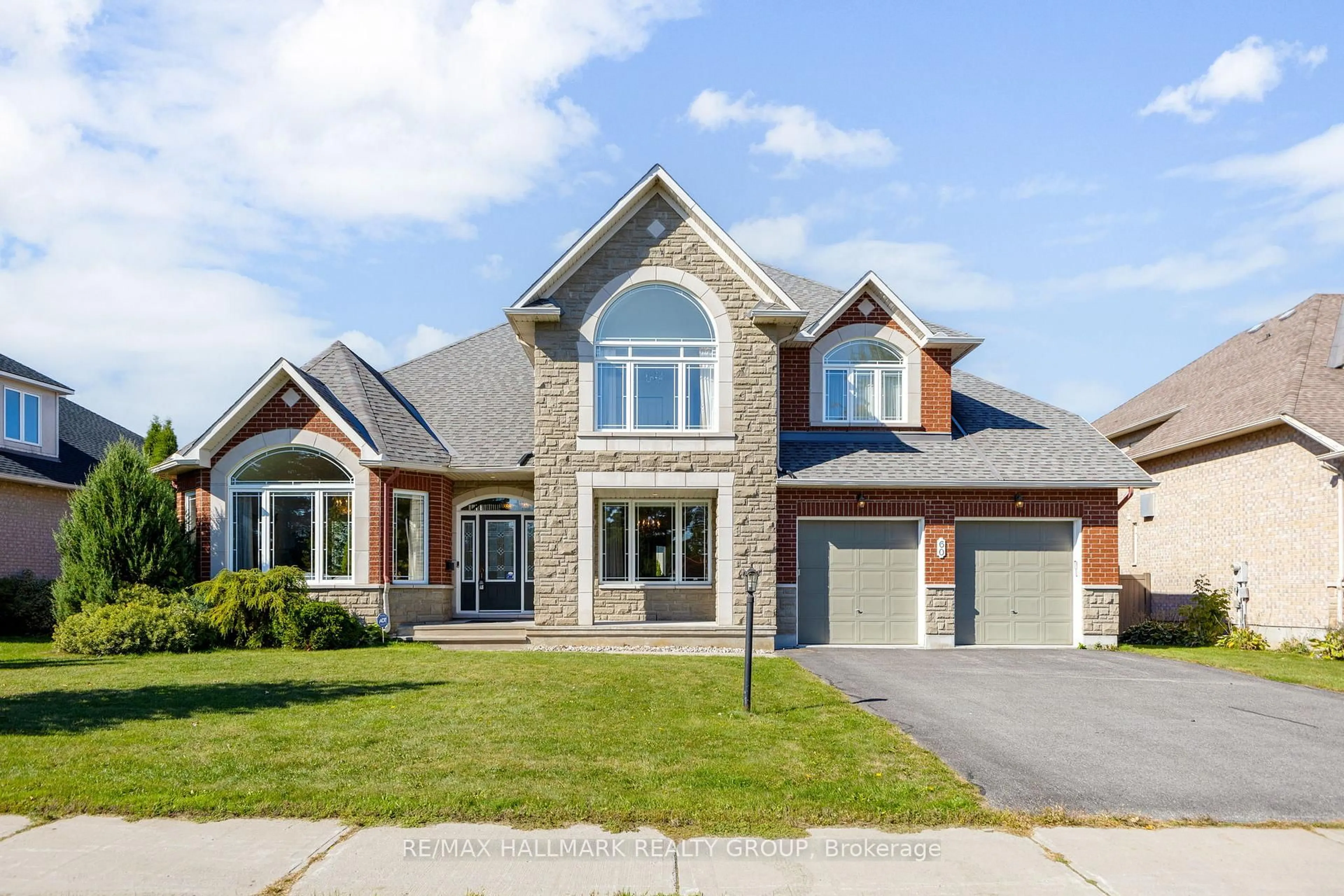 Home with brick exterior material, street for 60 Winding Way, Barrhaven Ontario K2G 6Y6