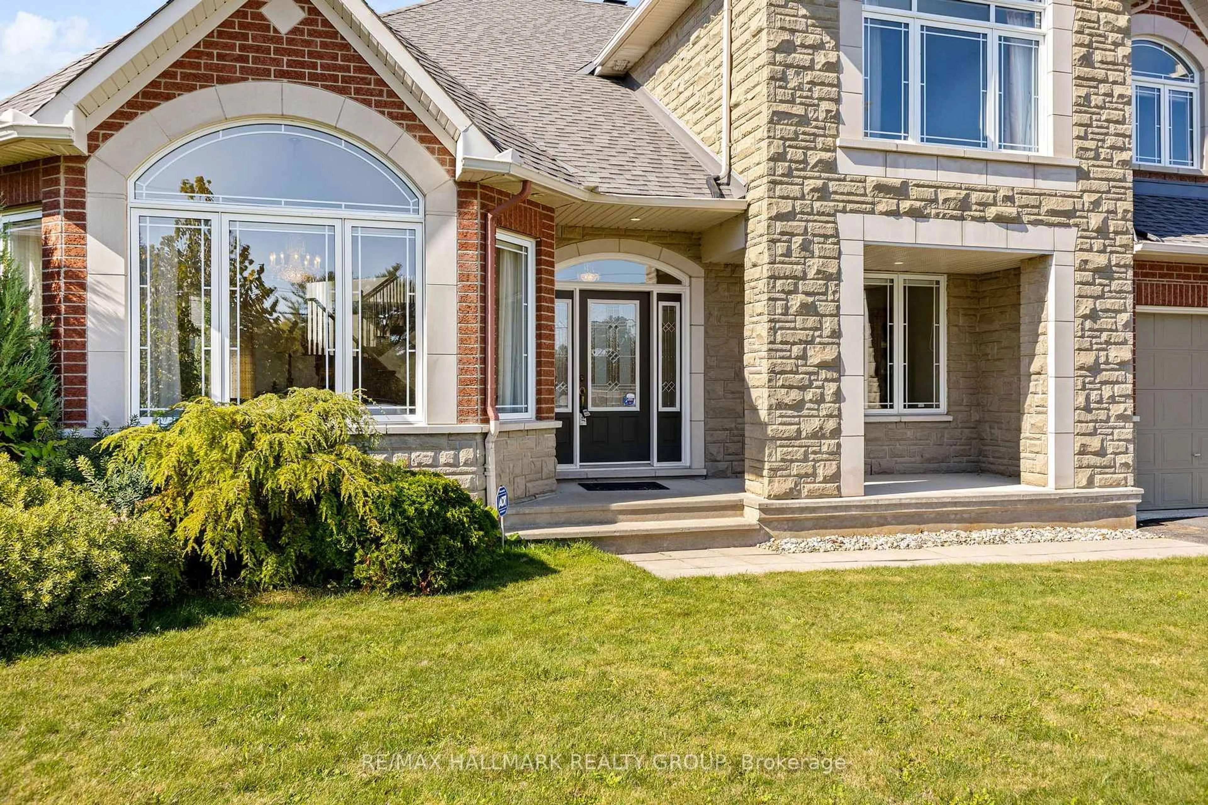 Home with brick exterior material, street for 60 Winding Way, Barrhaven Ontario K2G 6Y6