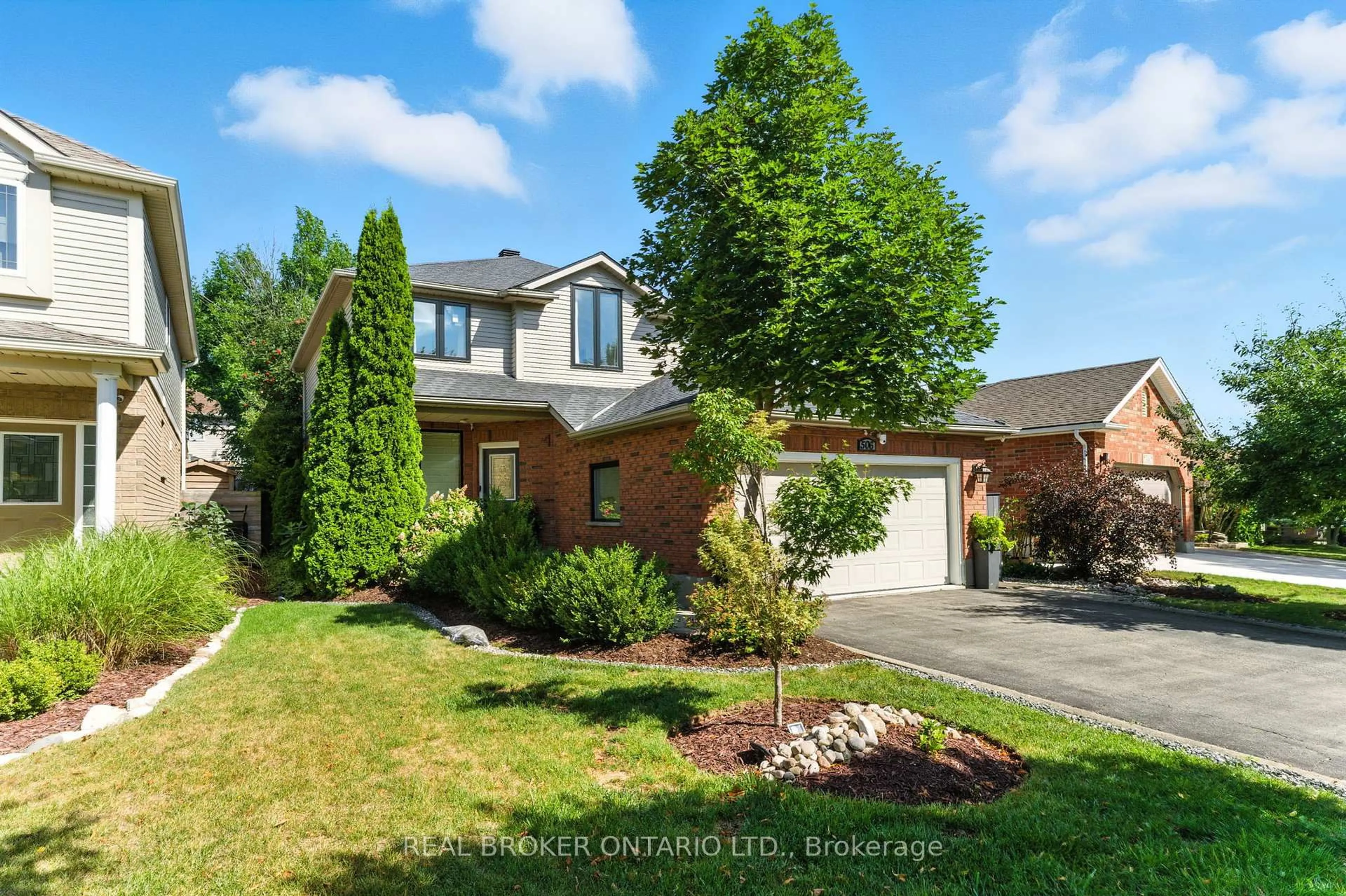 Home with brick exterior material, street for 506 Eastbridge Blvd, Waterloo Ontario N2K 3Z8