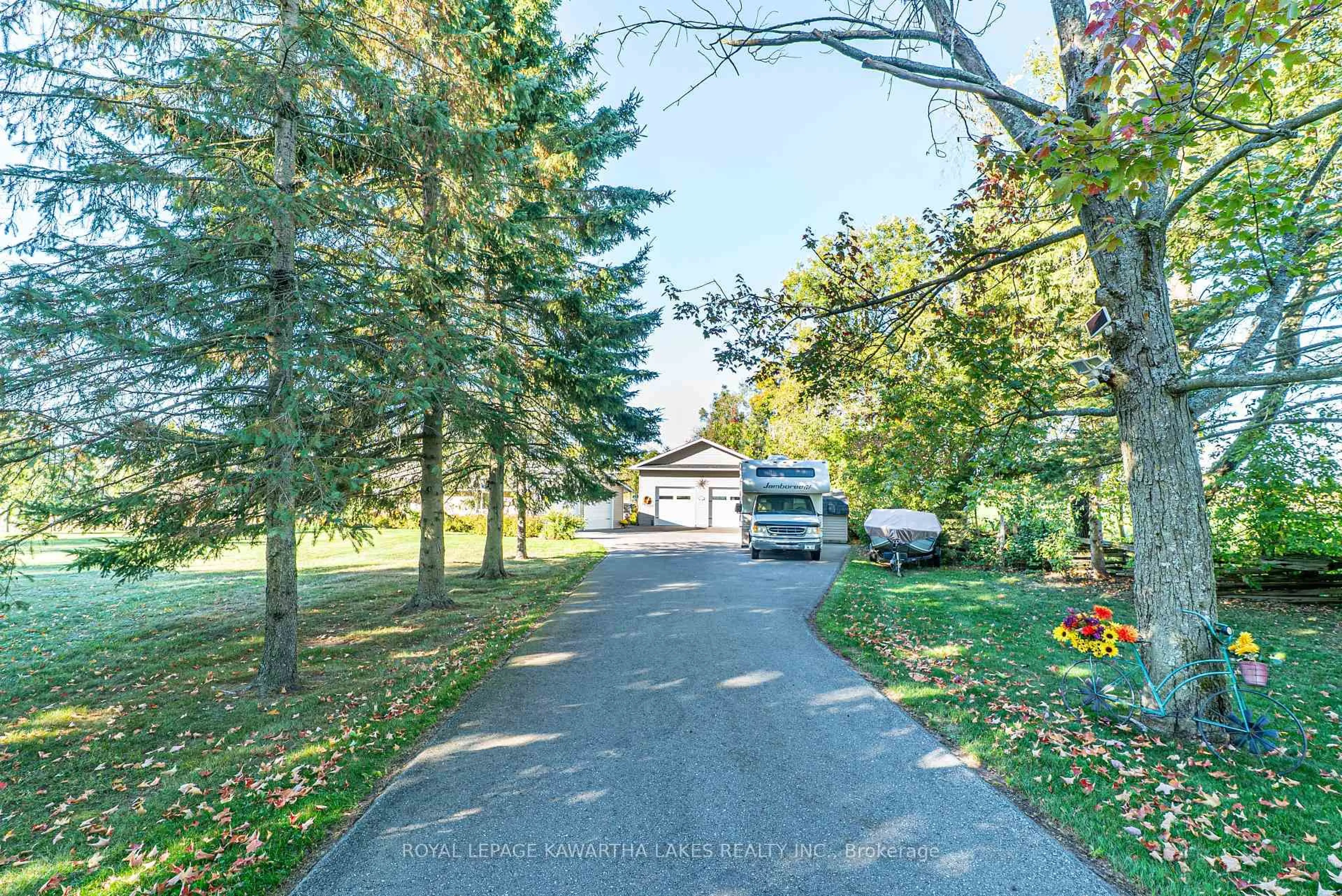 A pic from outside/outdoor area/front of a property/back of a property/a pic from drone, street for 2525 Elm Tree Rd, Kawartha Lakes Ontario K9V 4R1