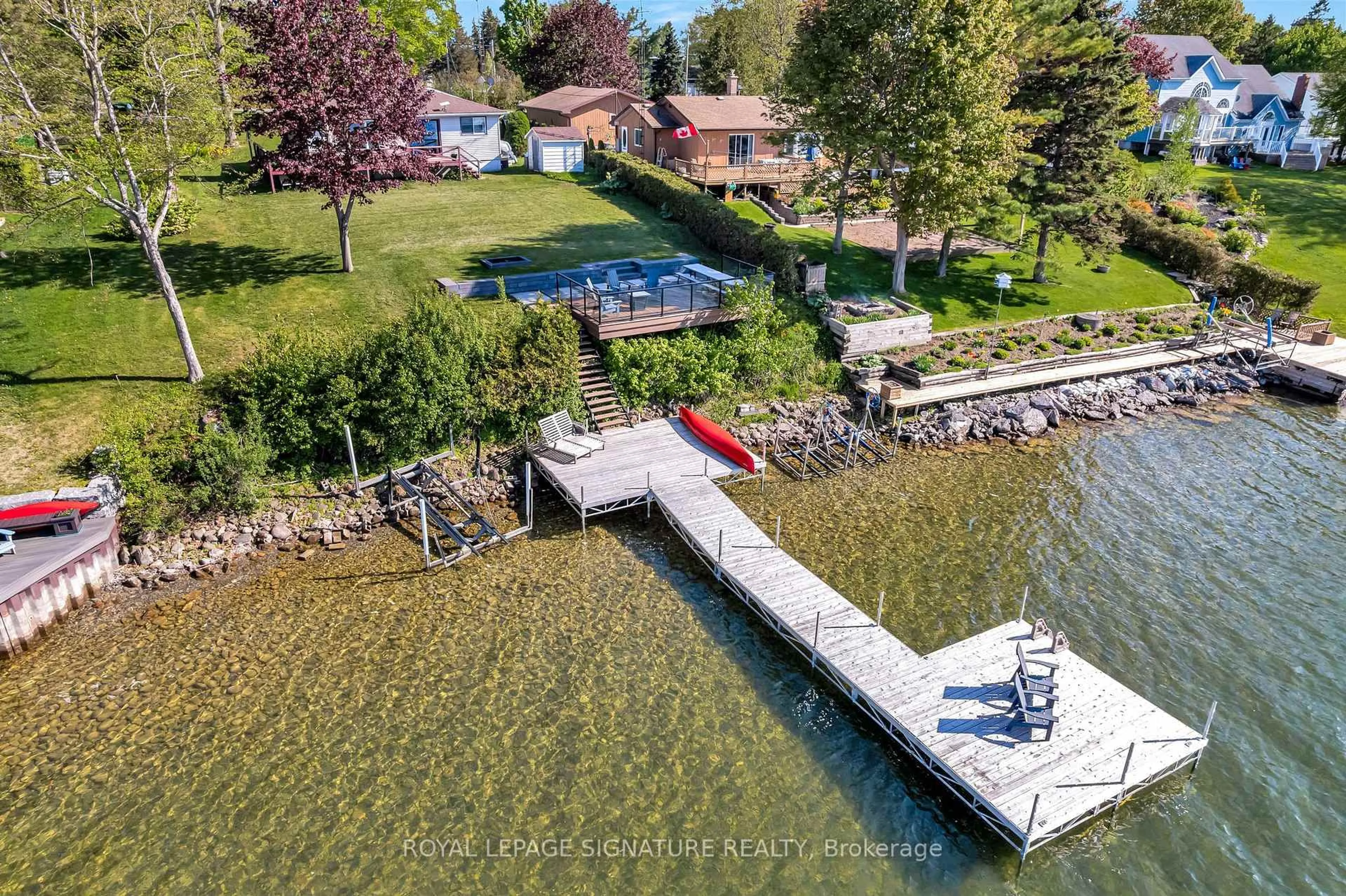 A pic from outside/outdoor area/front of a property/back of a property/a pic from drone, water/lake/river/ocean view for 318 Island Rd, Prince Edward County Ontario K0K 2T0