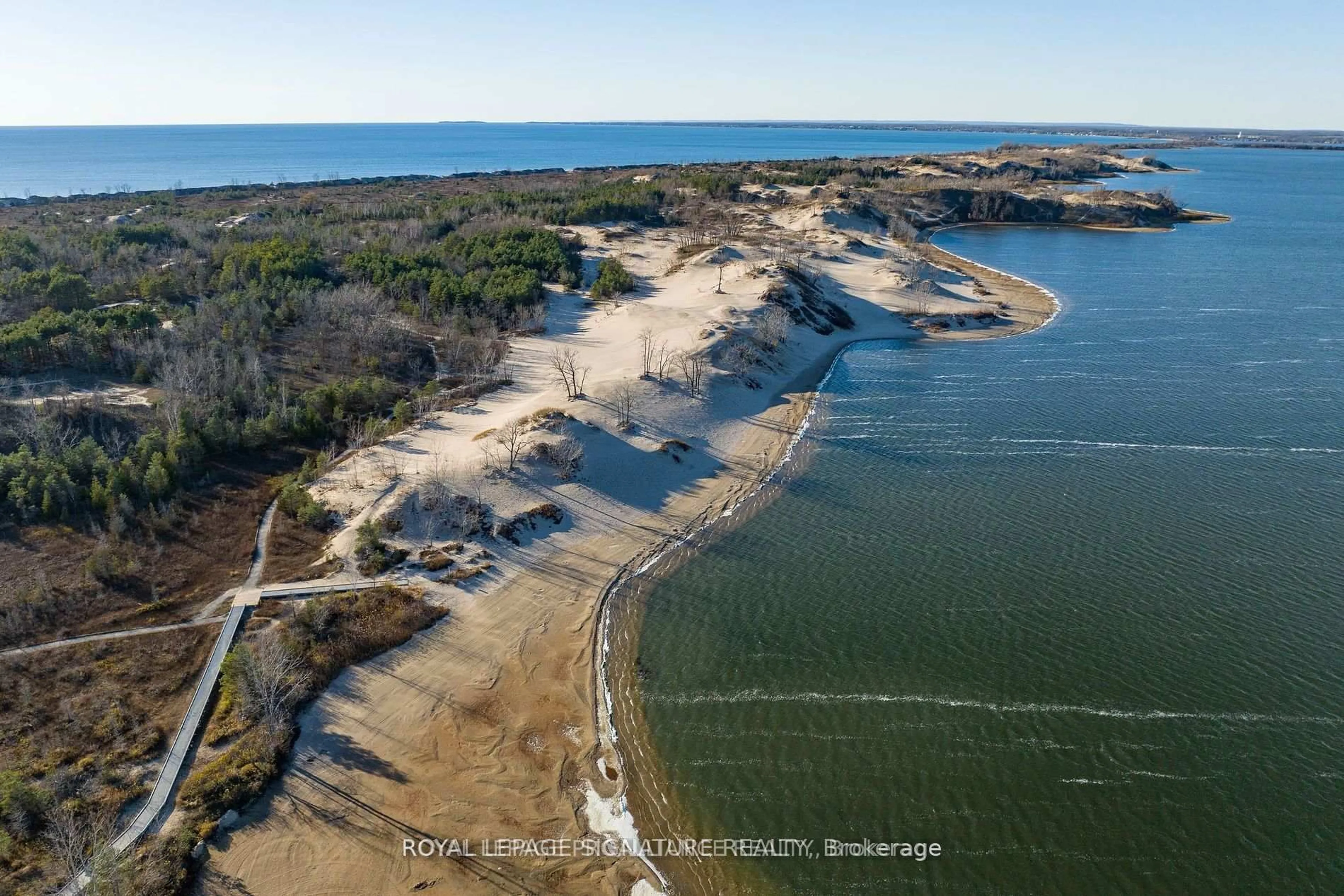 A pic from outside/outdoor area/front of a property/back of a property/a pic from drone, water/lake/river/ocean view for 318 Island Rd, Prince Edward County Ontario K0K 2T0