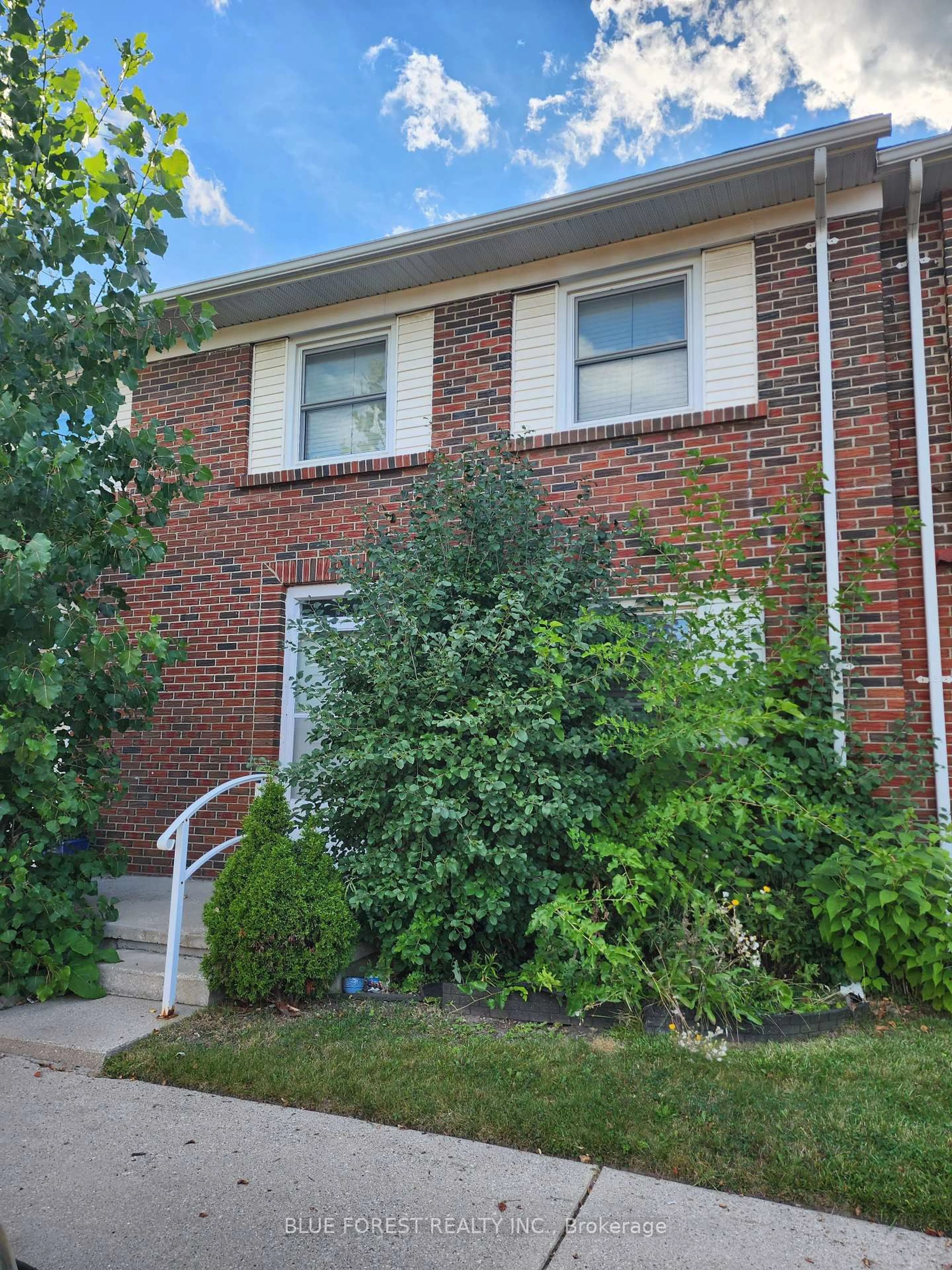 Home with brick exterior material, street for 1128 Southdale Rd #5, London South Ontario N6E 1B2