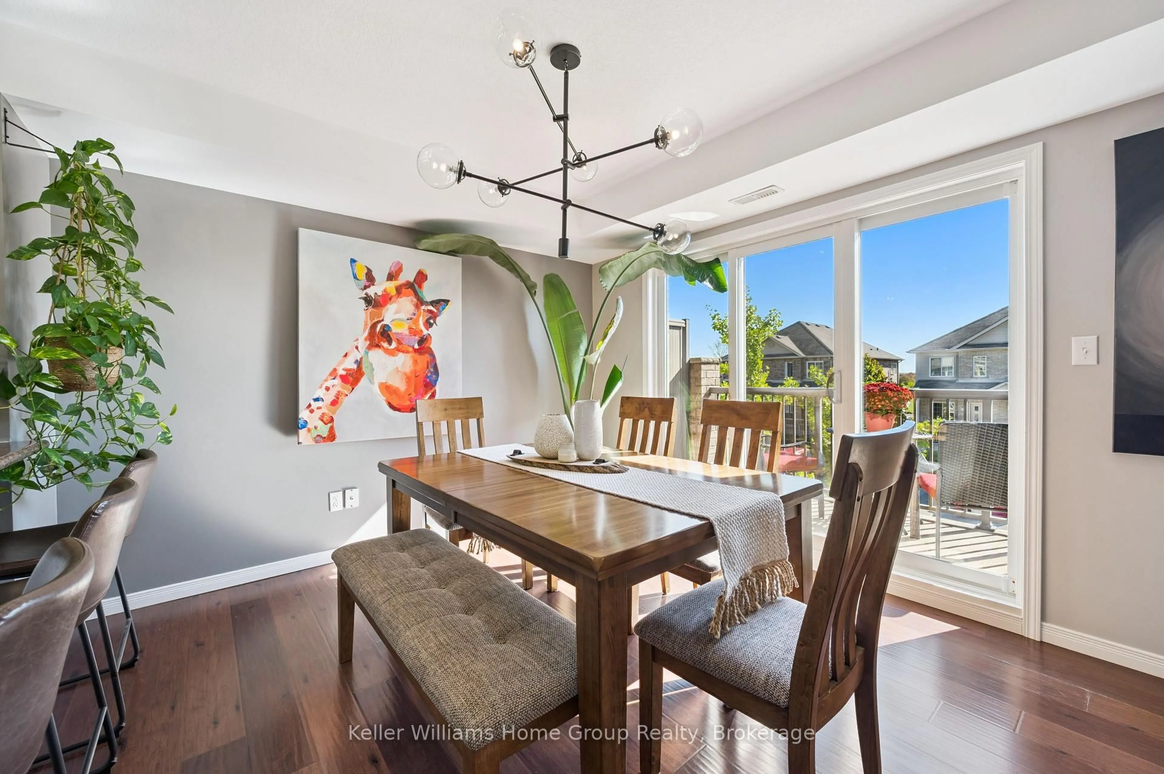 Dining room, wood/laminate floor for 35 Mountford Dr #22, Guelph Ontario N1E 0G6