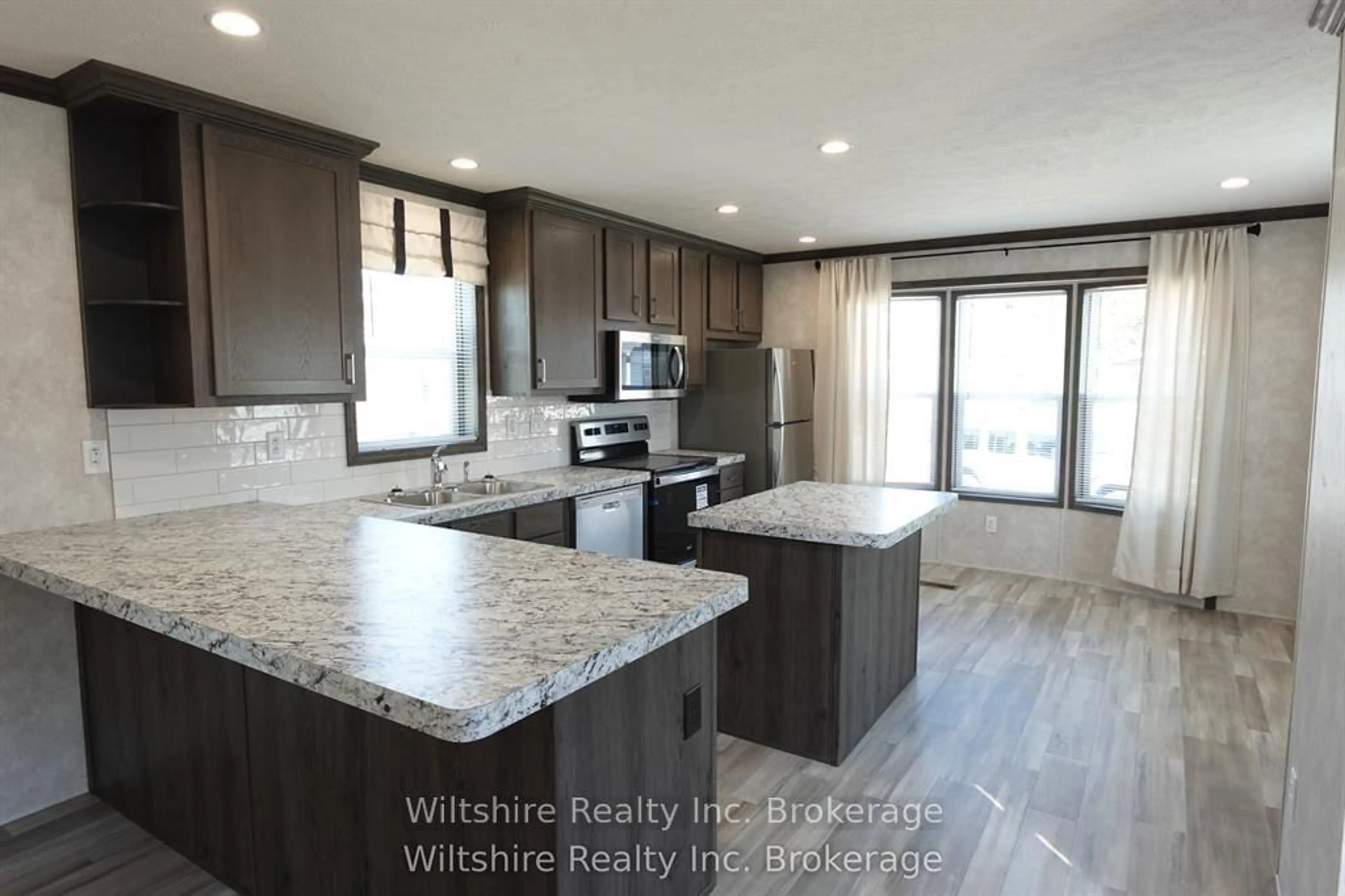 Open concept kitchen, unknown for 11981 Plank Rd (tillsonburg) Rd #9, Bayham Ontario N4G 4G9