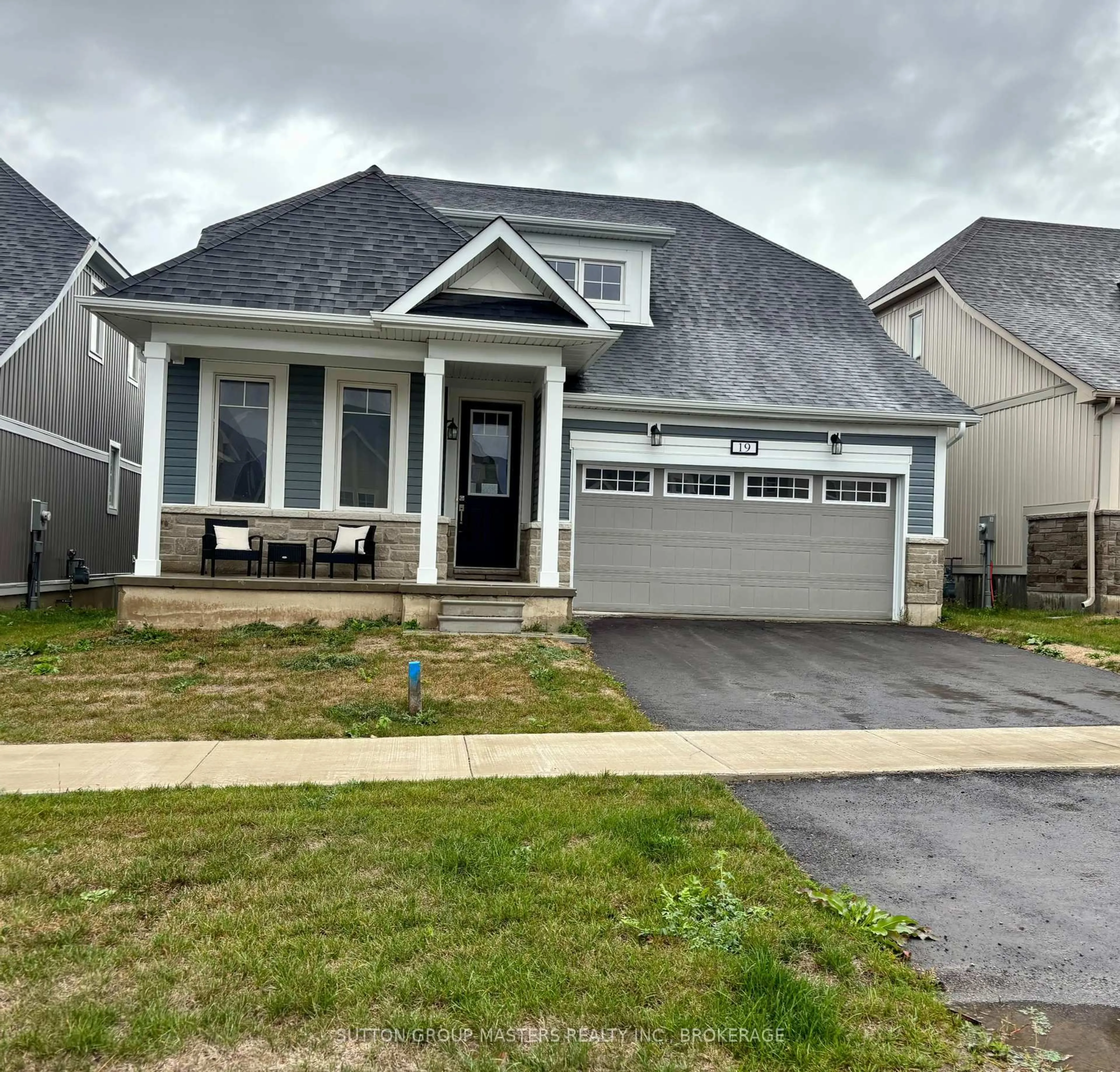 Home with vinyl exterior material, street for 19 OAKMONT Dr, Bath Ontario K0H 1G0