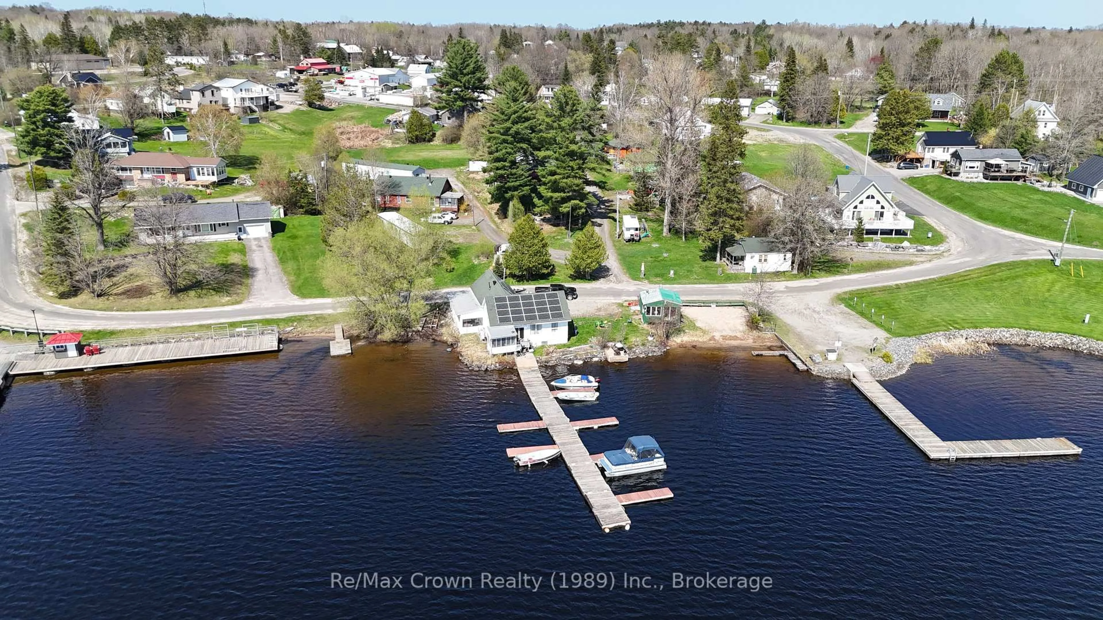 A pic from outside/outdoor area/front of a property/back of a property/a pic from drone, water/lake/river/ocean view for 84-85 Wilson Lake Rd, Parry Sound Remote Area Ontario P0H 1Y0