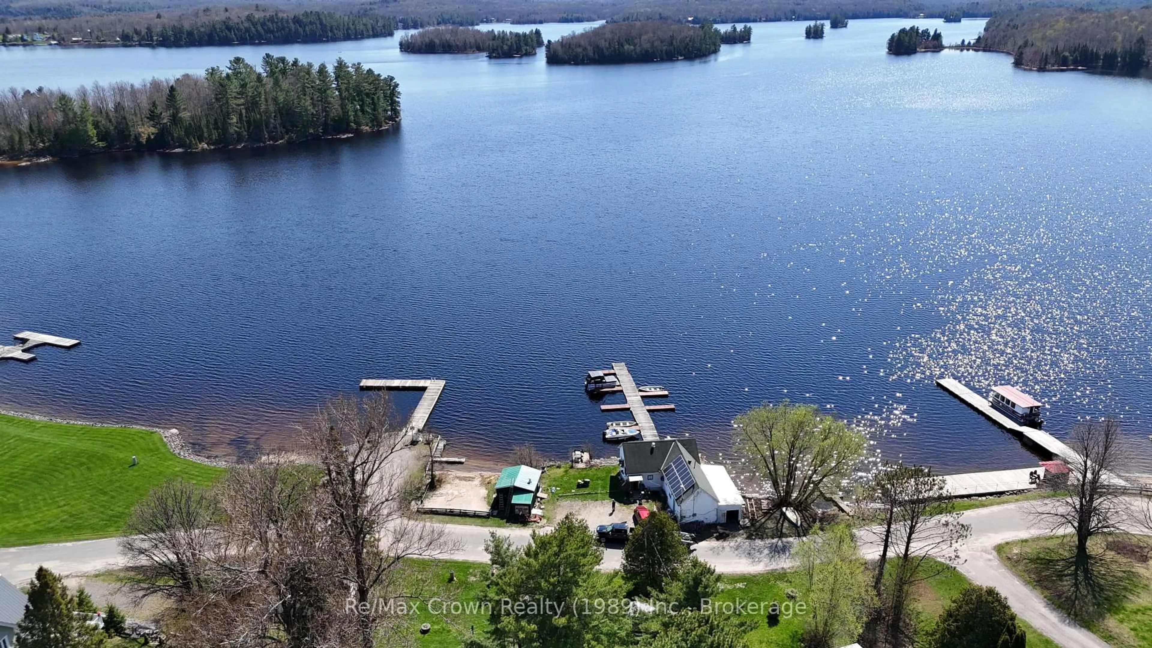 A pic from outside/outdoor area/front of a property/back of a property/a pic from drone, water/lake/river/ocean view for 84-85 Wilson Lake Rd, Parry Sound Remote Area Ontario P0H 1Y0