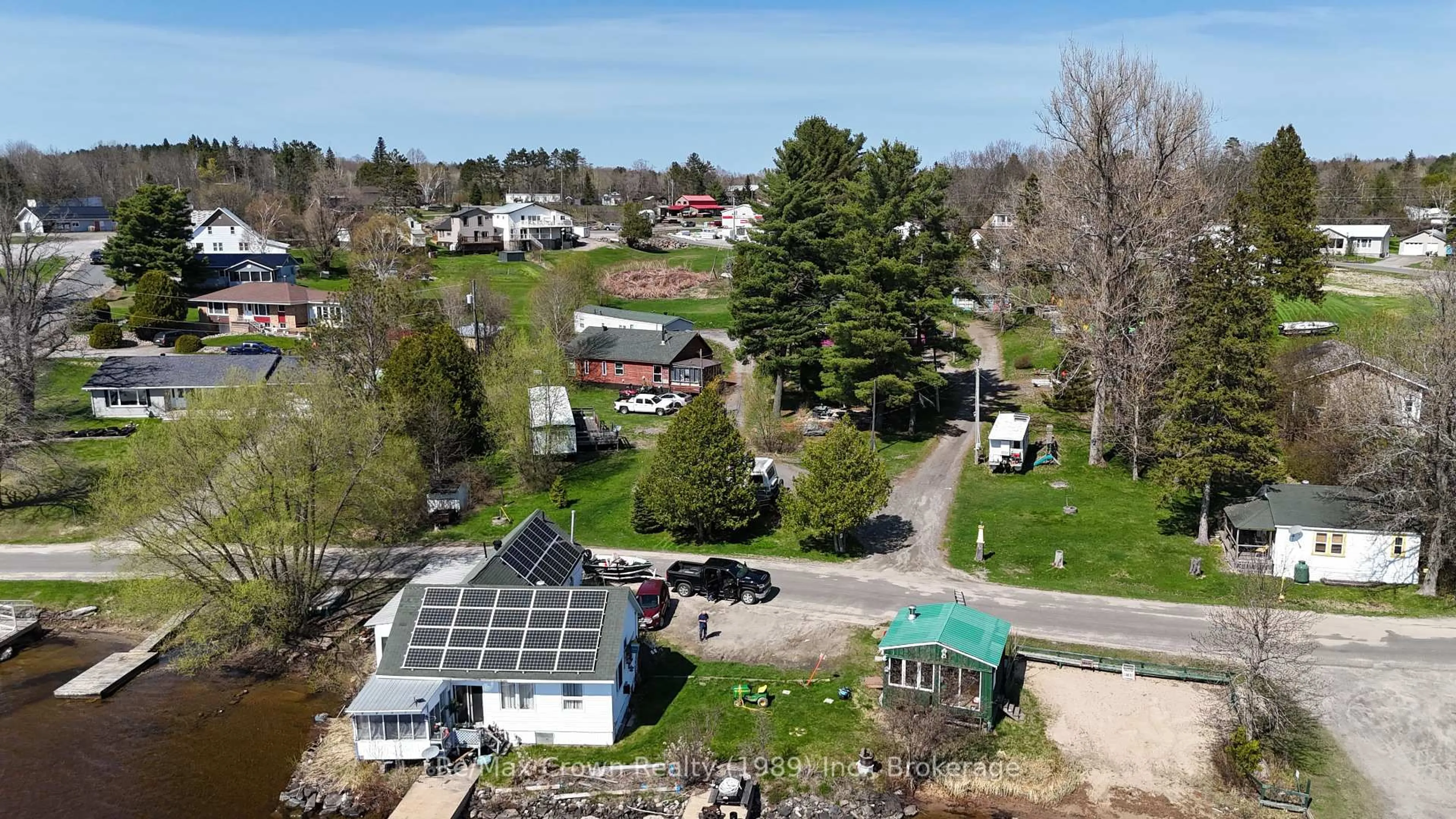 A pic from outside/outdoor area/front of a property/back of a property/a pic from drone, street for 84-85 Wilson Lake Rd, Parry Sound Remote Area Ontario P0H 1Y0
