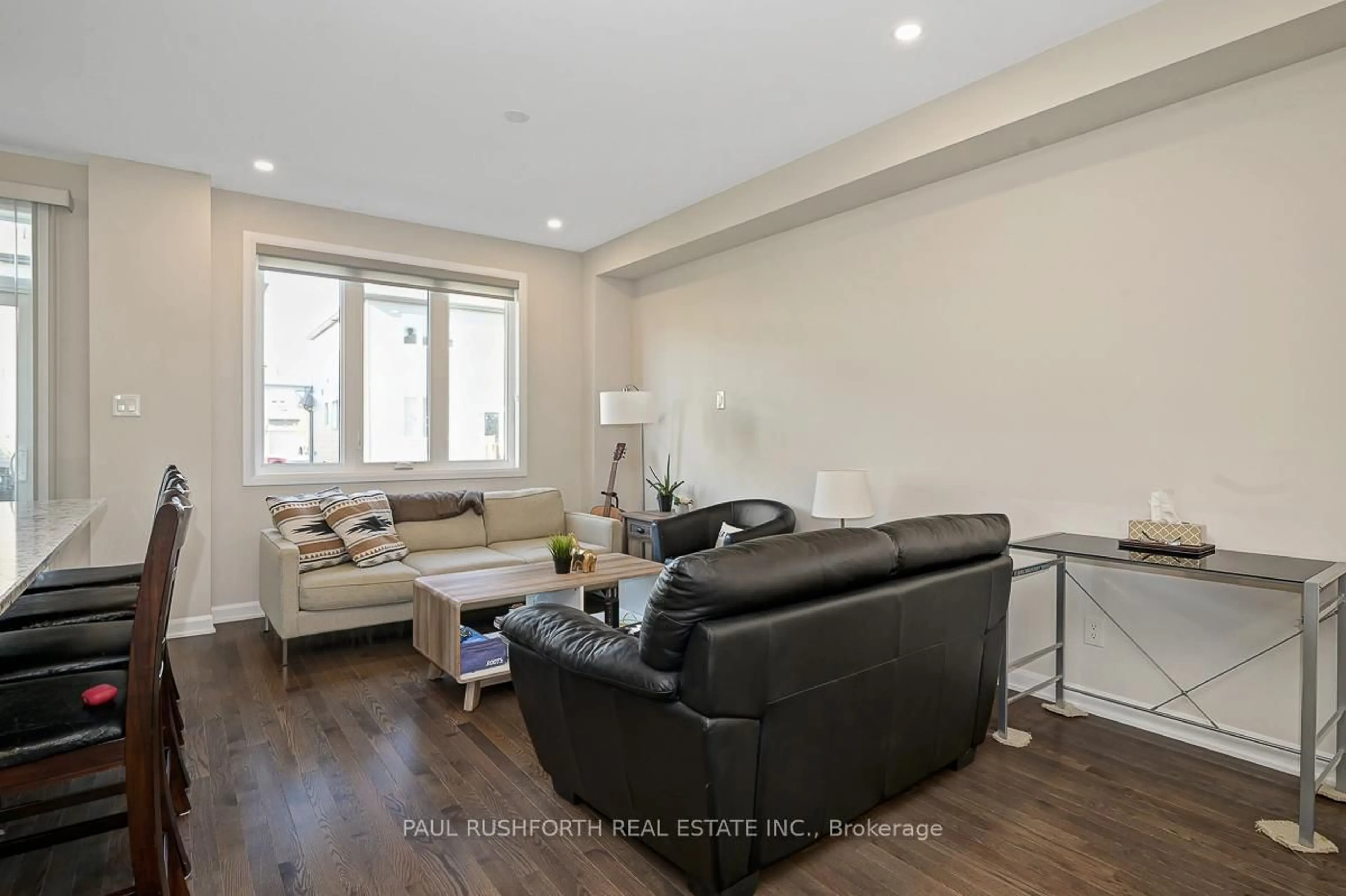 Living room with furniture, wood/laminate floor for 559 Decoeur Dr, Ottawa Ontario K4A 5G7