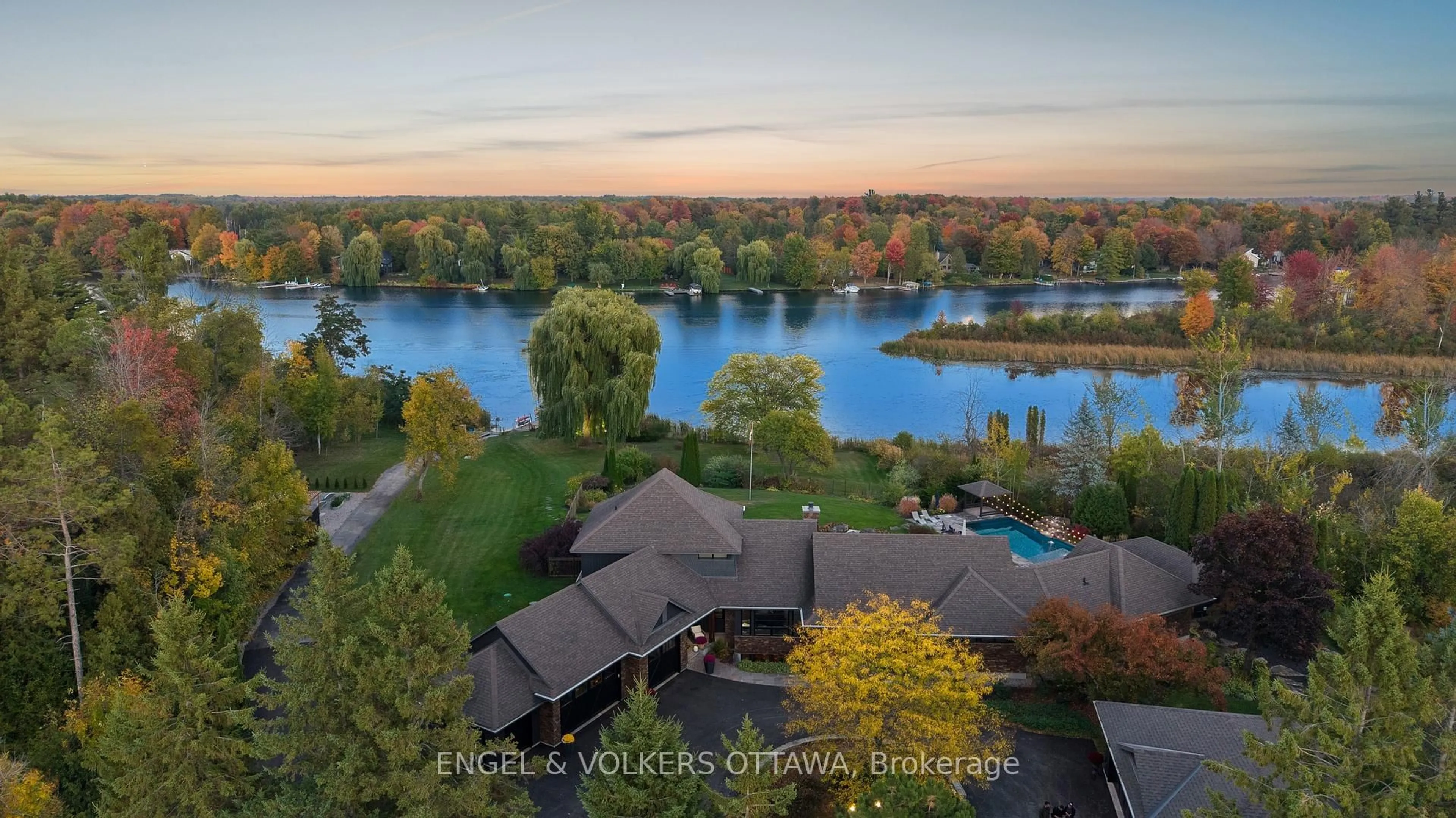 A pic from outside/outdoor area/front of a property/back of a property/a pic from drone, water/lake/river/ocean view for 6351 Rideau Valley Dr, Manotick Ontario K4M 1B3