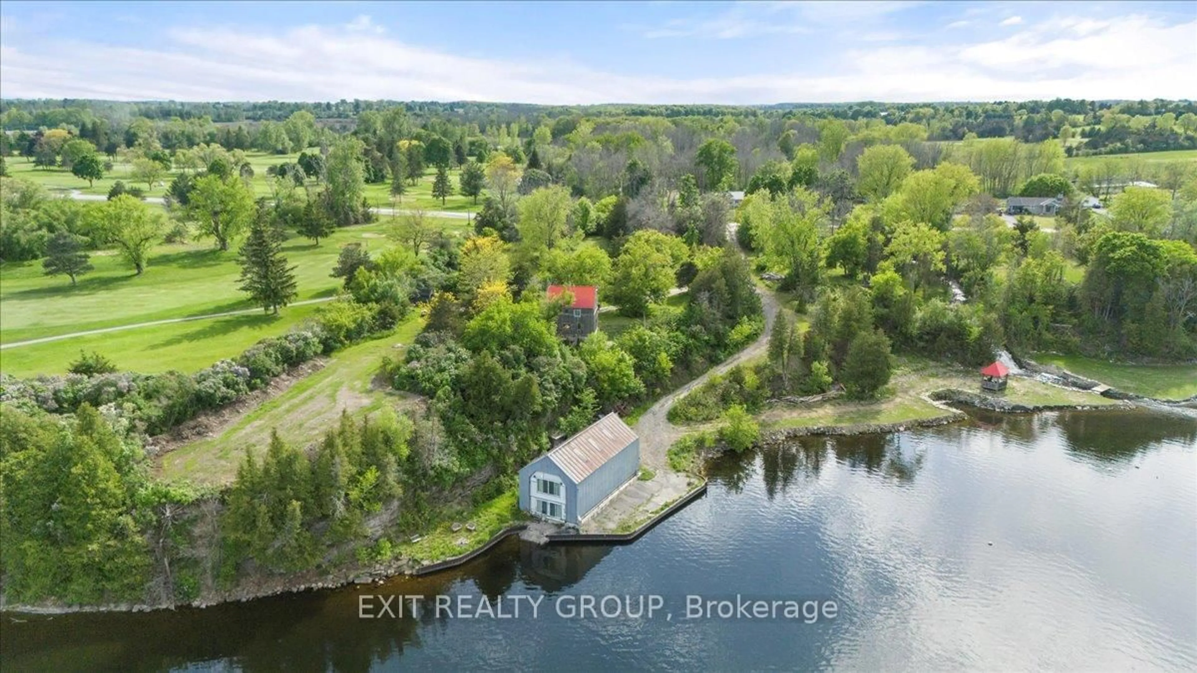 A pic from outside/outdoor area/front of a property/back of a property/a pic from drone, water/lake/river/ocean view for 782 County Rd 49, Prince Edward County Ontario K0K 2T0