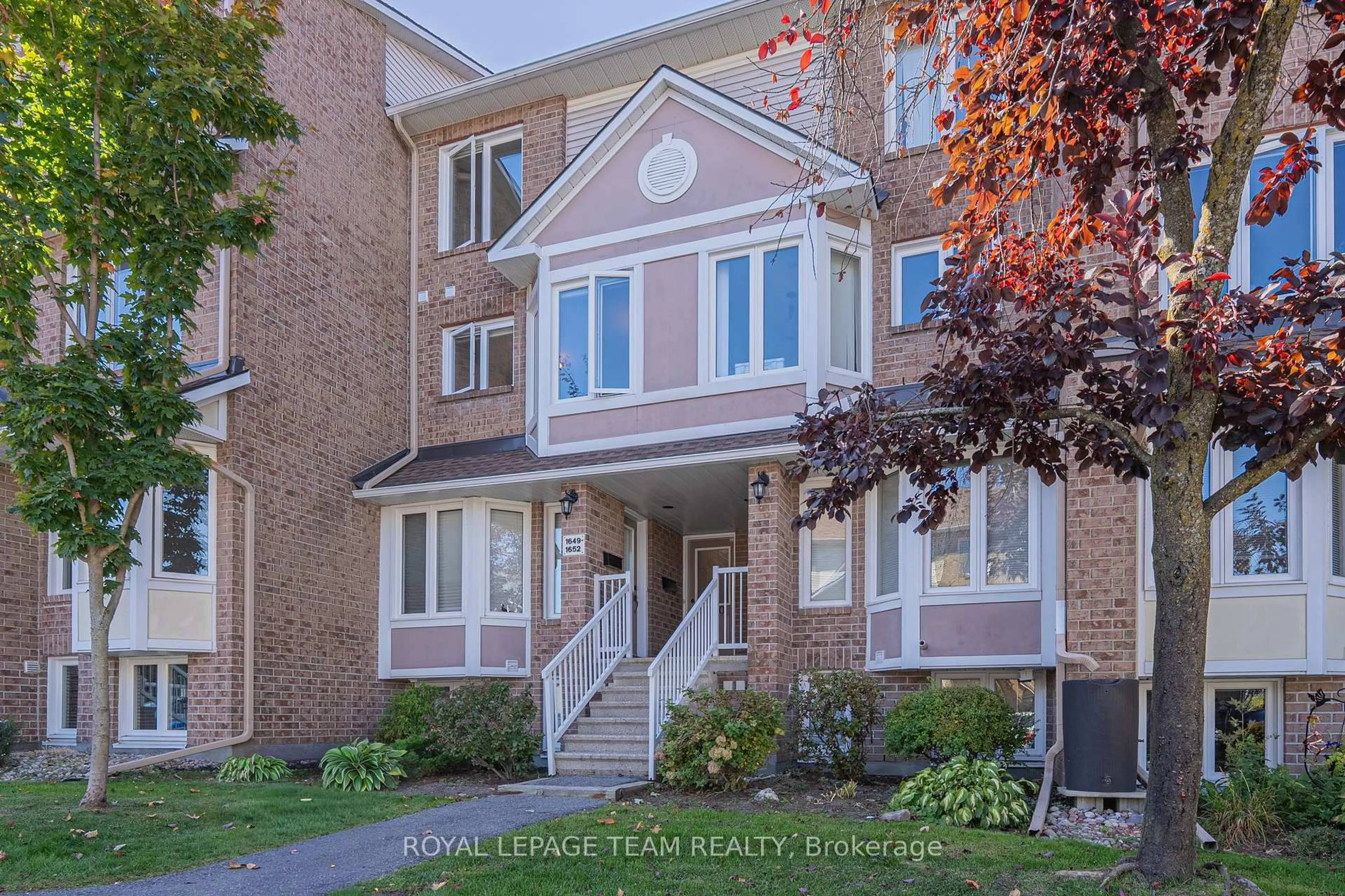 Home with brick exterior material, street for 1650 Locksley Lane, Ottawa Ontario K1J 1B6