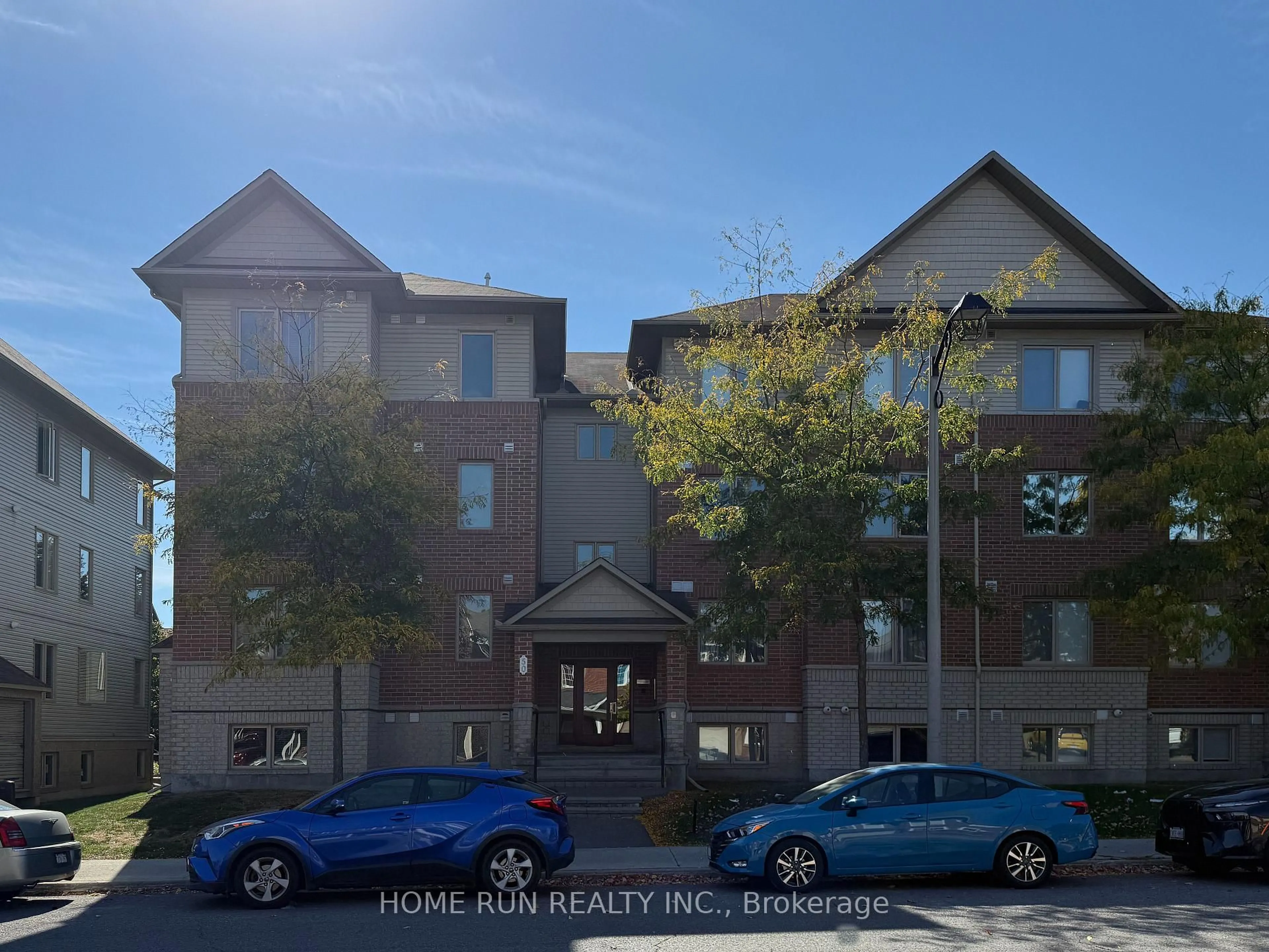 A pic from outside/outdoor area/front of a property/back of a property/a pic from drone, street for 50 Barnstone Dr #6, Ottawa Ontario K2G 6X2