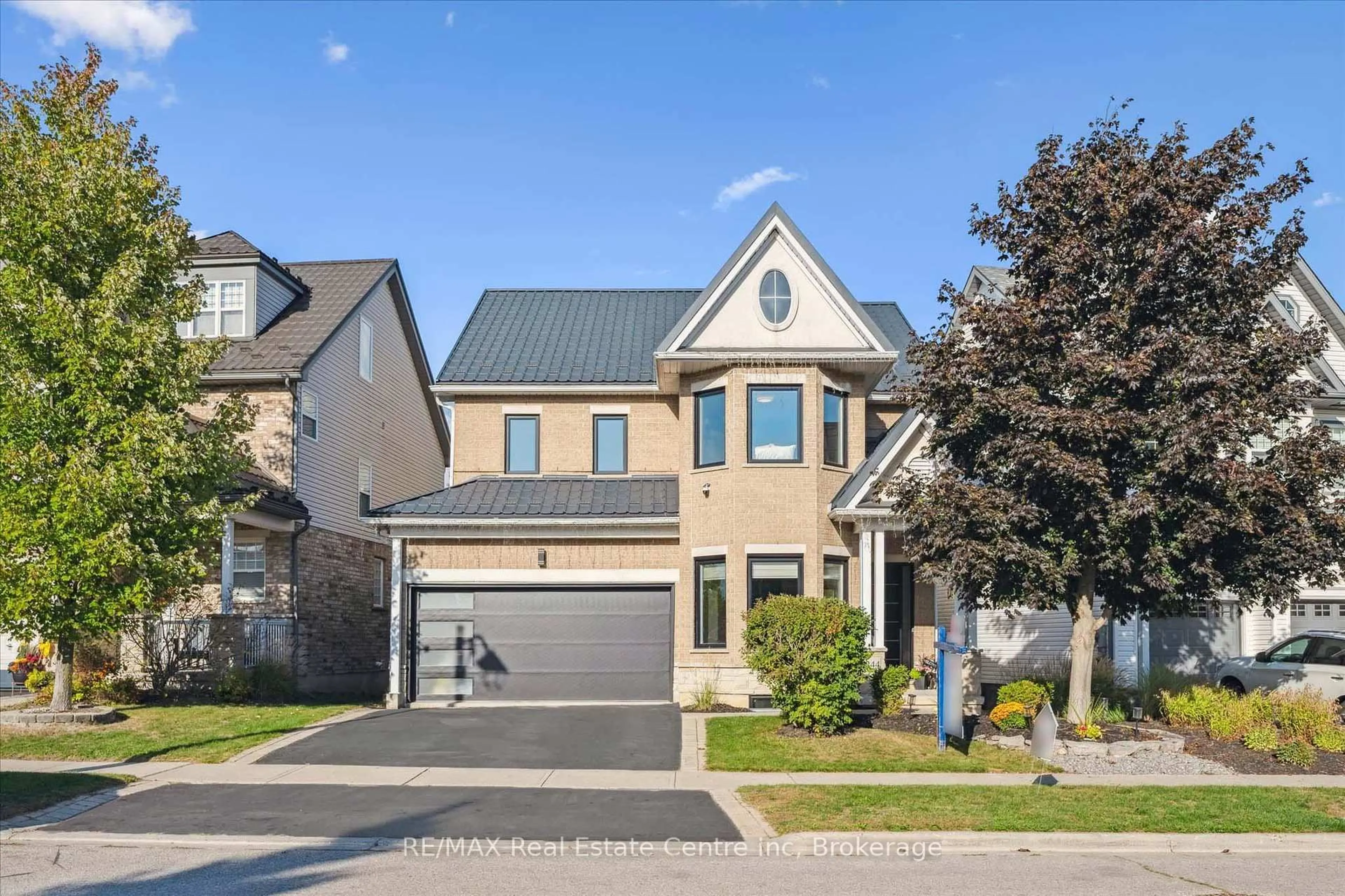 Home with brick exterior material, street for 244 Carrington Dr, Guelph Ontario N1G 5K2