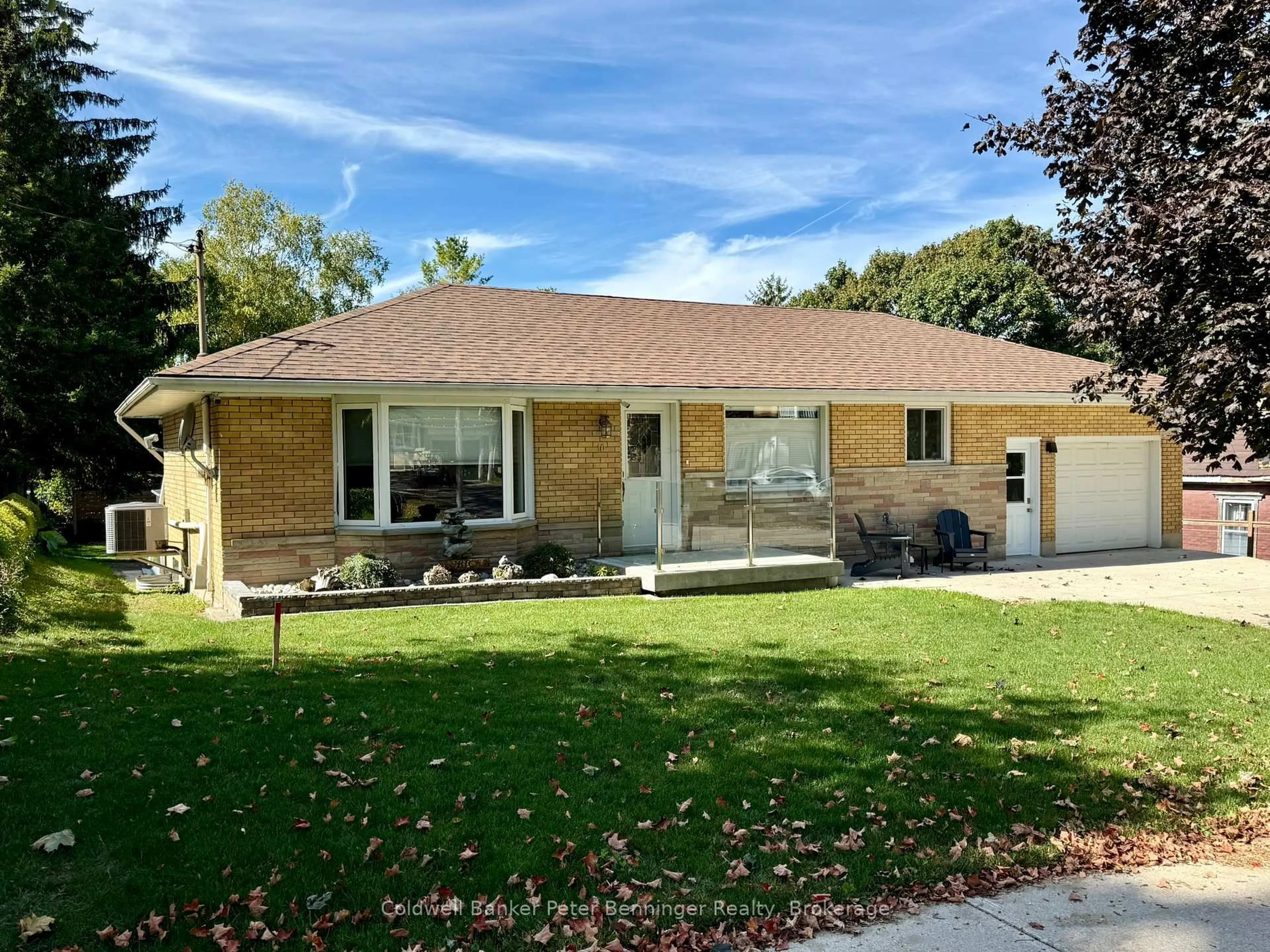 Home with vinyl exterior material, street for 10 Brownlee St, South Bruce Ontario N0G 2S0