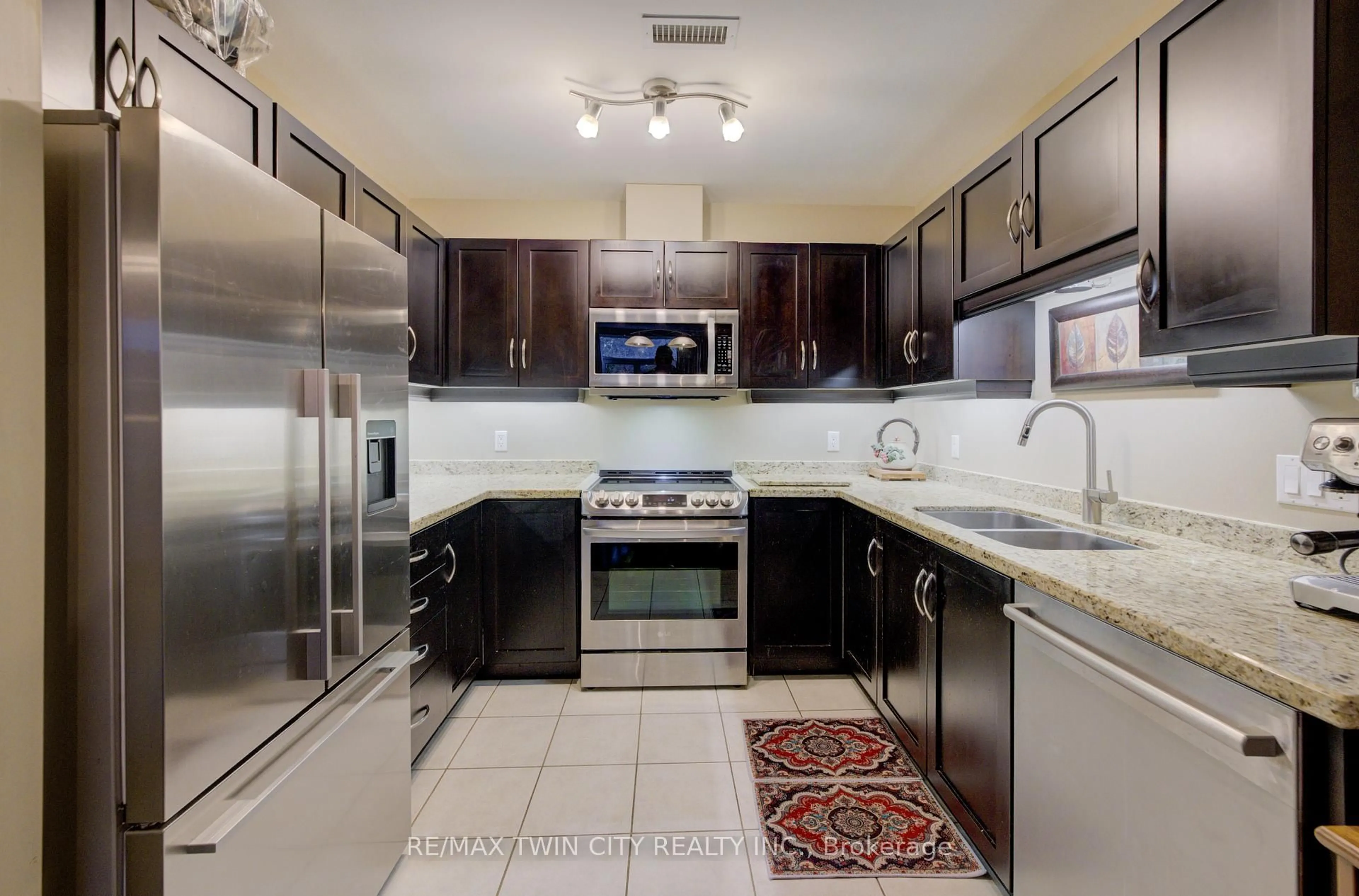 Standard kitchen, ceramic/tile floor for 165 Duke St #105, Kitchener Ontario N2H 6T8