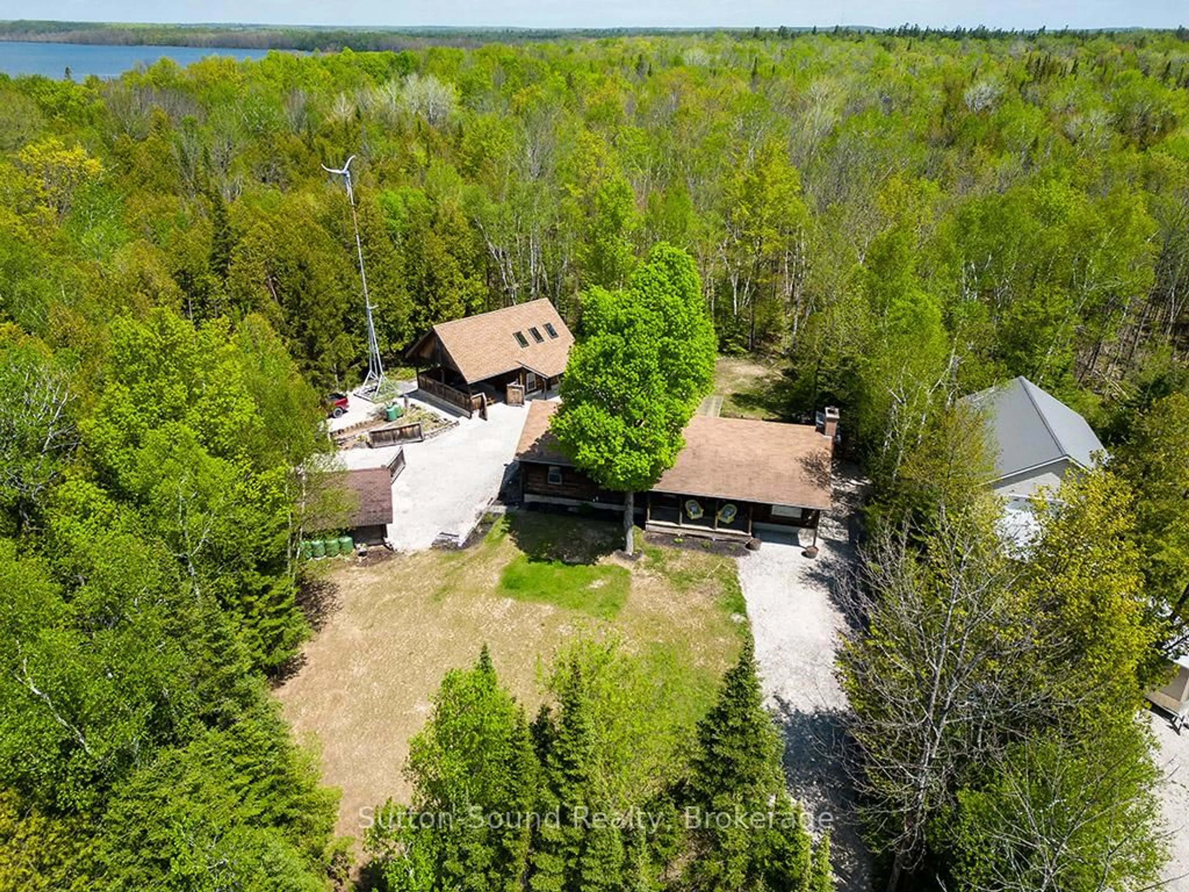 A pic from outside/outdoor area/front of a property/back of a property/a pic from drone, water/lake/river/ocean view for 642 BOAT LAKE Rd, South Bruce Peninsula Ontario N0H 2T0