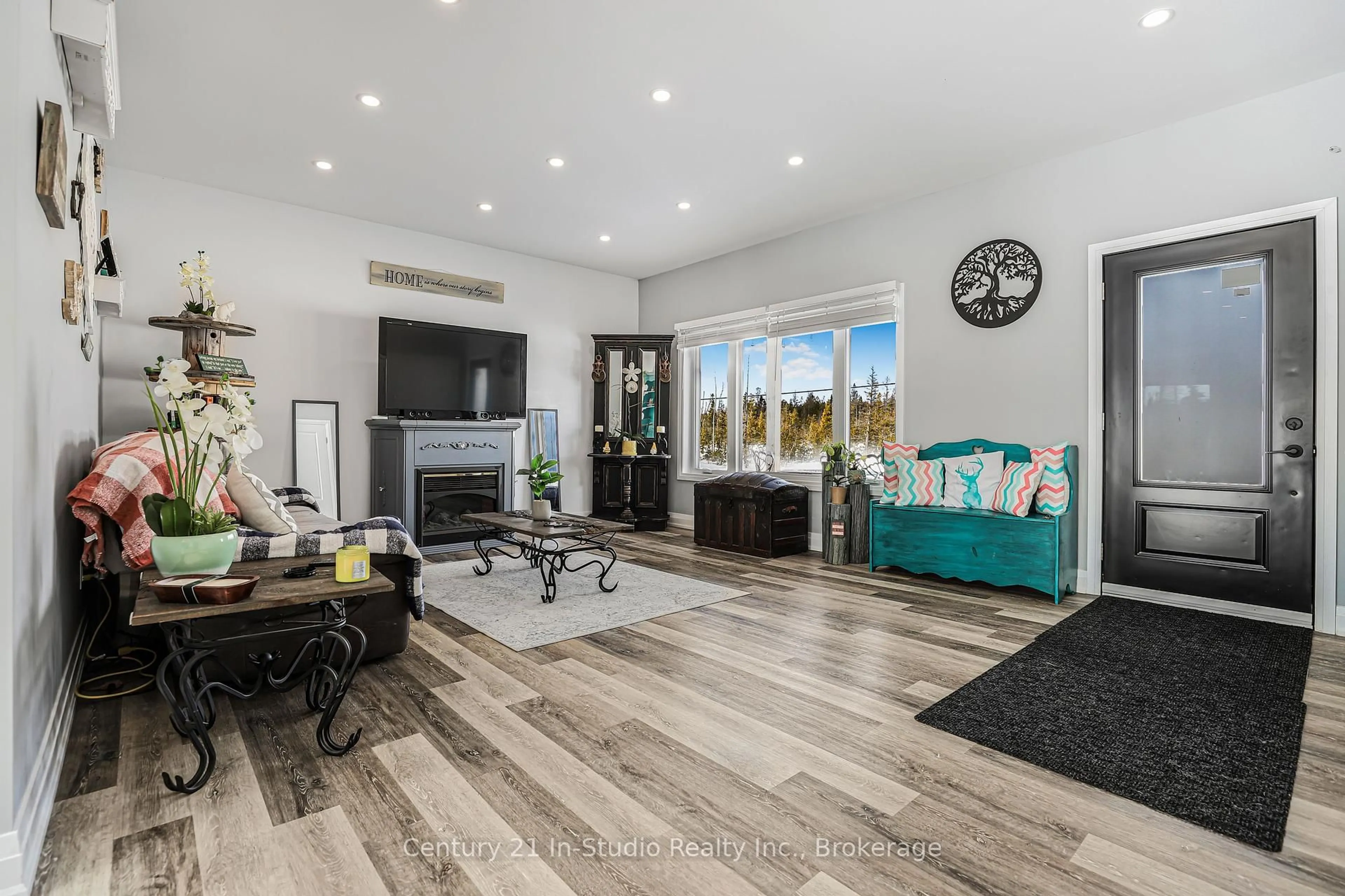 Living room with furniture, wood/laminate floor for 621 Lindsay Road 30 Rd, Northern Bruce Peninsula Ontario N0H 1Z0