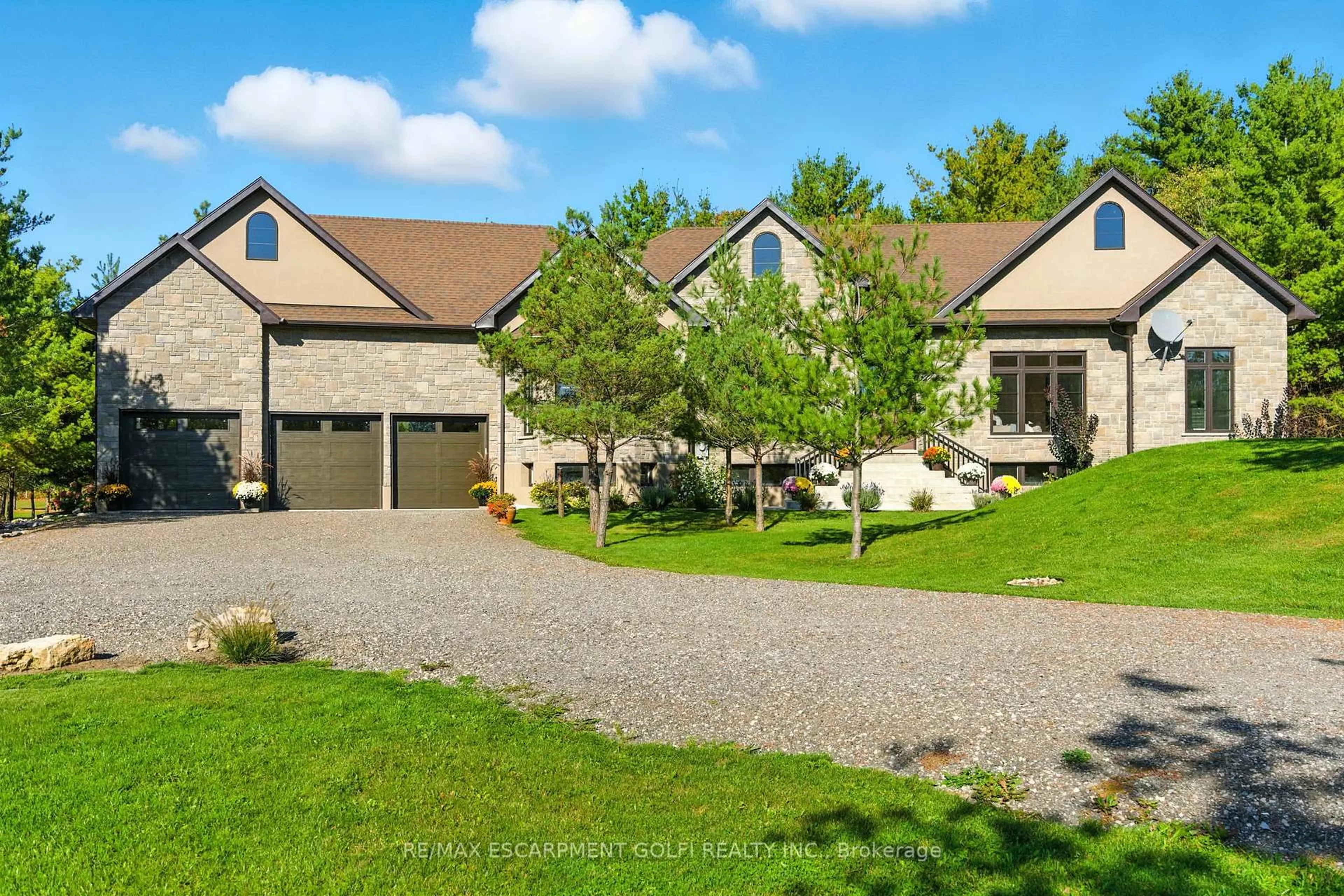 A pic from outside/outdoor area/front of a property/back of a property/a pic from drone, unknown for 986 Highway 8, Hamilton Ontario L9H 5E1