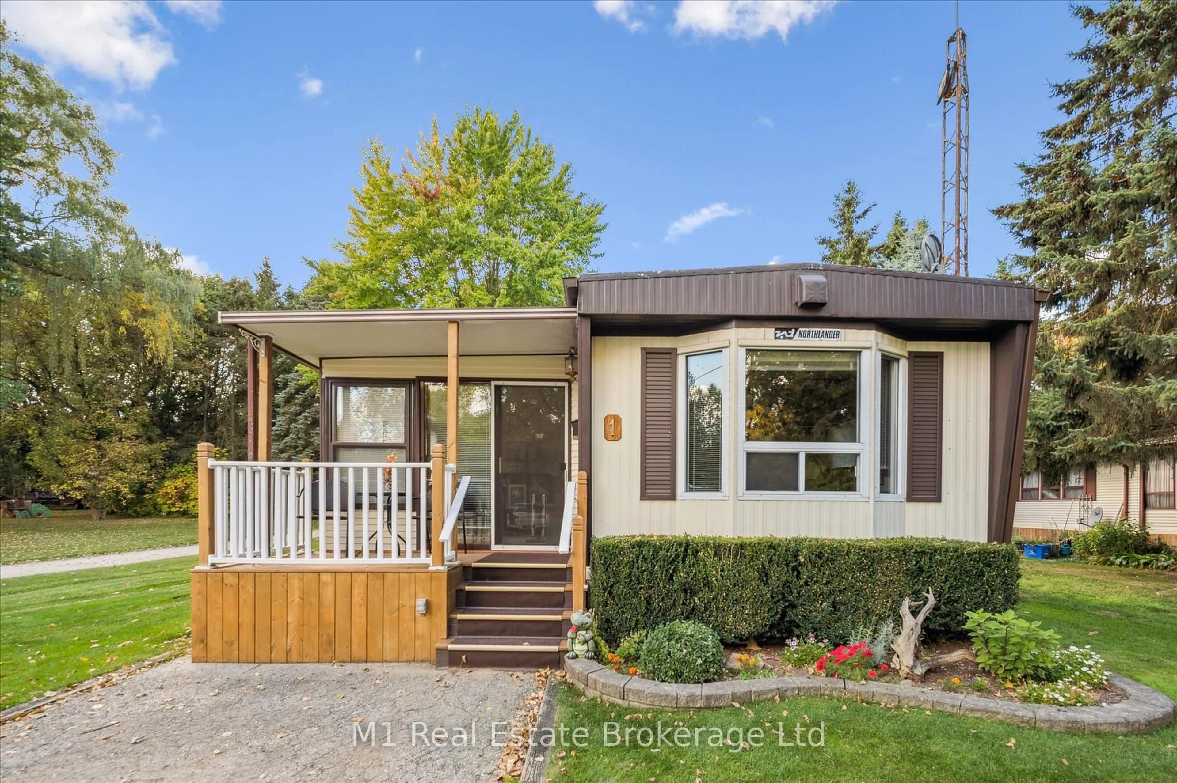 Home with vinyl exterior material, street for 1 Grand Vista Dr, Wellington North Ontario N0G 2L0