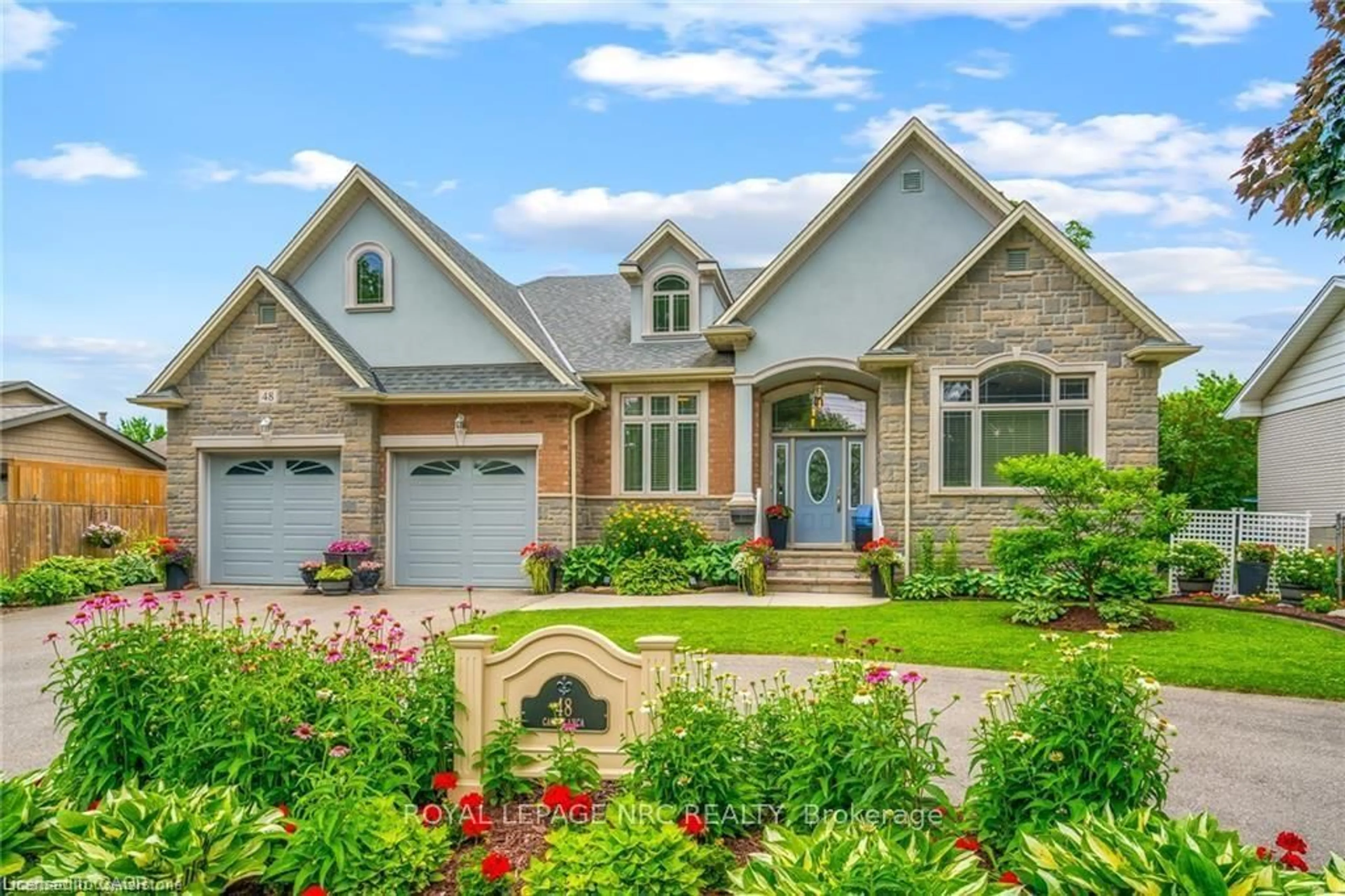 Home with brick exterior material, street for 48 Casablanca Blvd, Grimsby Ontario L3M 3Z2