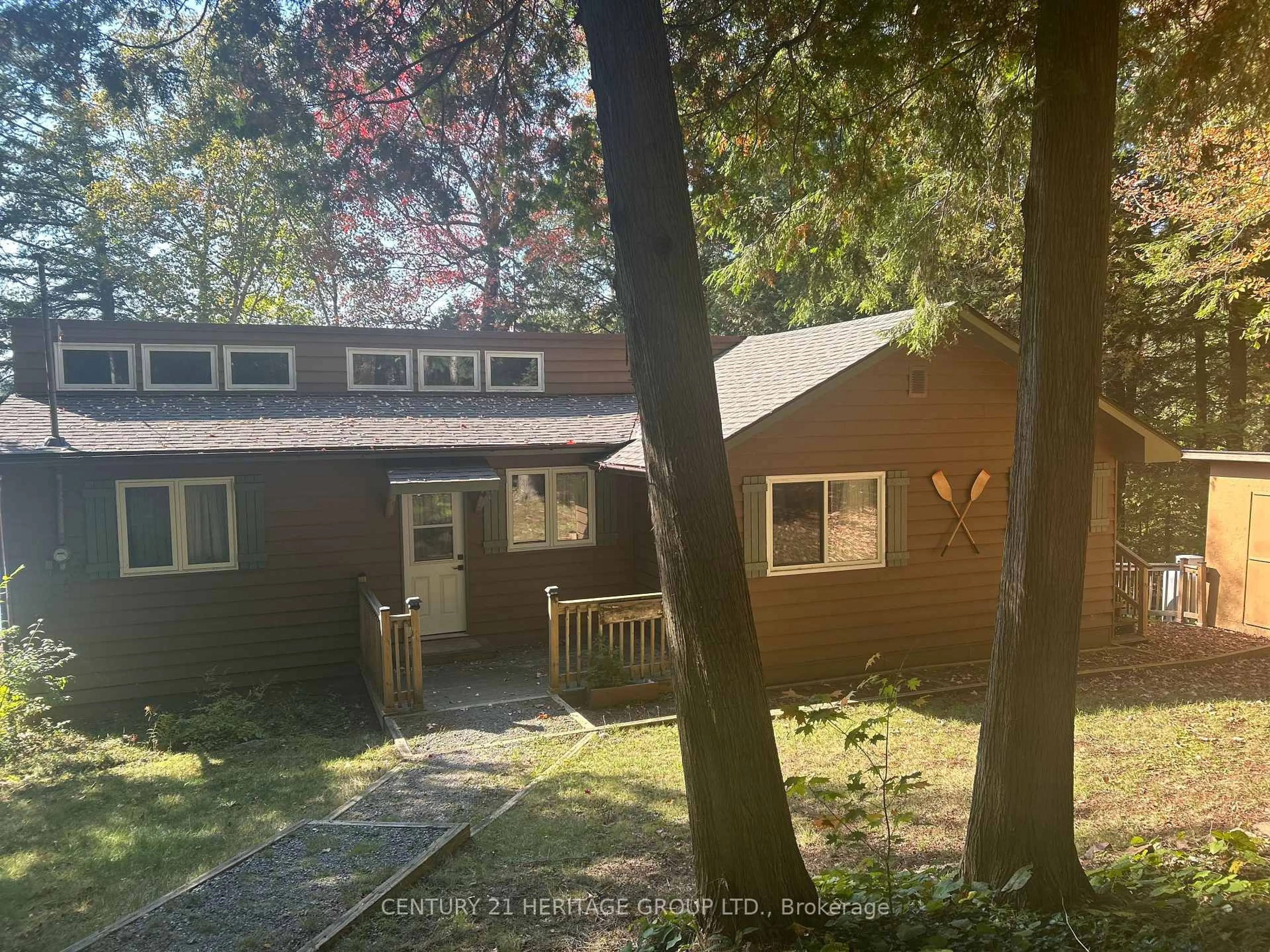 A pic from outside/outdoor area/front of a property/back of a property/a pic from drone, forest/trees view for 49 Point Rd, Seguin Ontario P2A 0B2