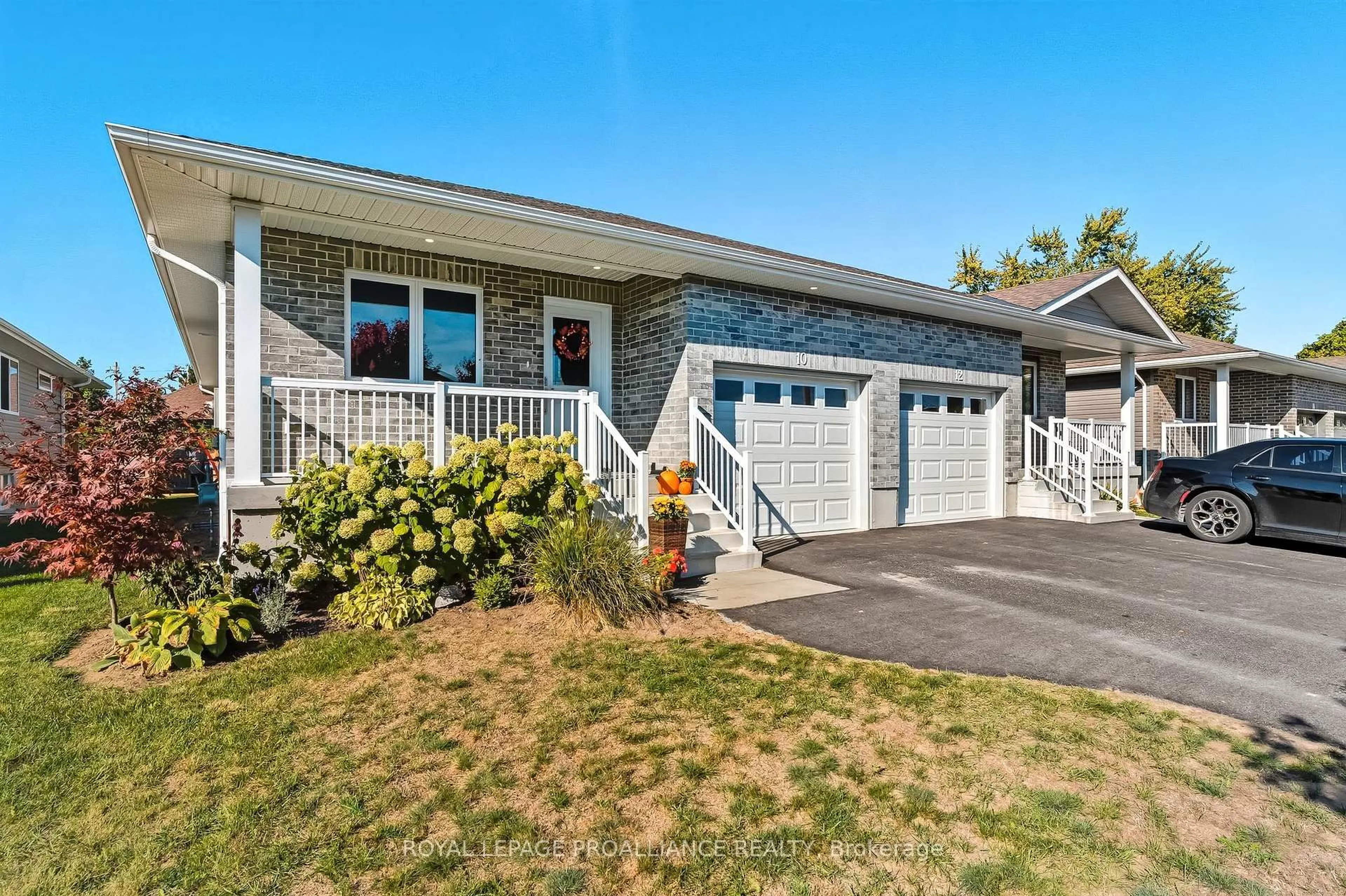 Home with vinyl exterior material, street for 10 Cassidey Dr, Brighton Ontario K0K 1H0